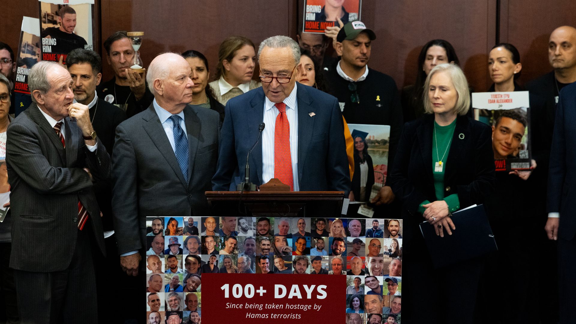 Senator Jim Risch, a Republican from Idaho, from left, Senator Ben Cardin, a Democrat from Maryland, Senate Majority Leader Chuck Schumer, a Democrat from New York, and Senator Kirsten Gillibrand, a Democrat from New York, during a news conference with relatives of hostages taken by Hamas.