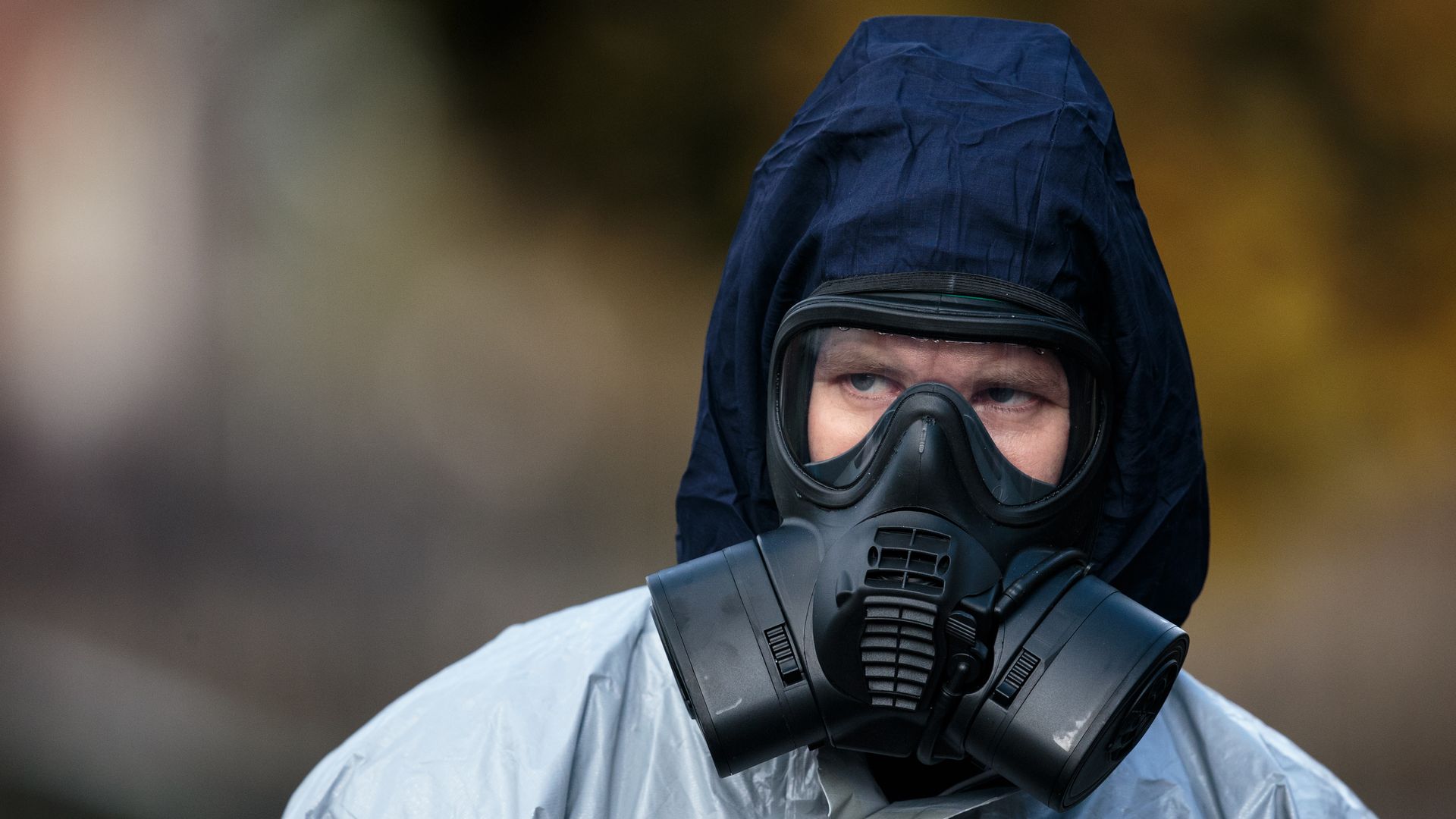 Police officer in a protective mask and suit in Salisbury, England.