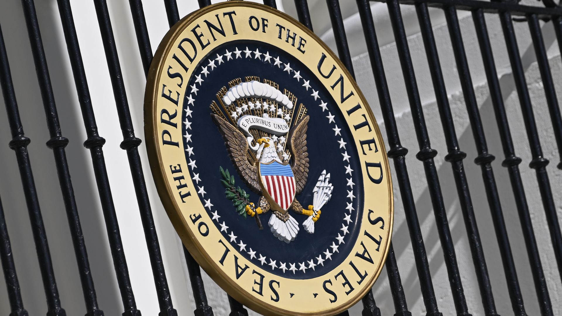 The White House logo on a fence 
