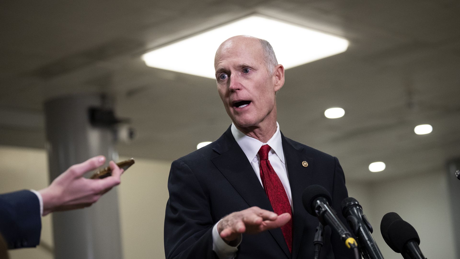 Sen. Rick Scott (R-FL) speaks to reporters on his way to a classified all-Senate briefing on Artificial Intelligence at the U.S. Capitol on July 11, 2023 in Washington, DC.
