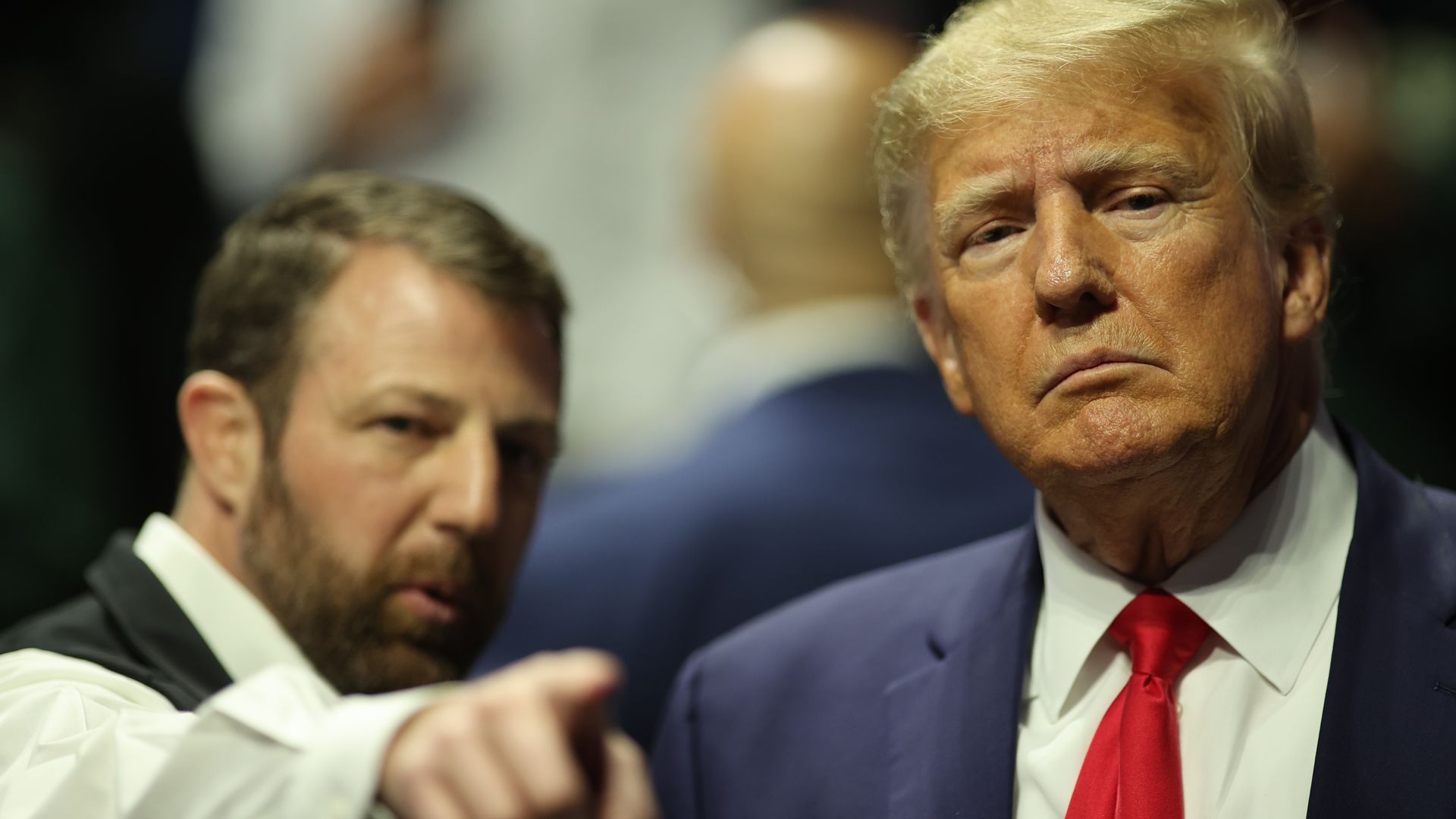 Oklahoma senator Markwayne Mullin stands on the floor with former President Donald Trump during the Division I Mens Wrestling Championship held at the BOK Center on March 18, 2023 in Tulsa, Oklahoma. Photo: Shane Bevel/NCAA Photos via Getty Images