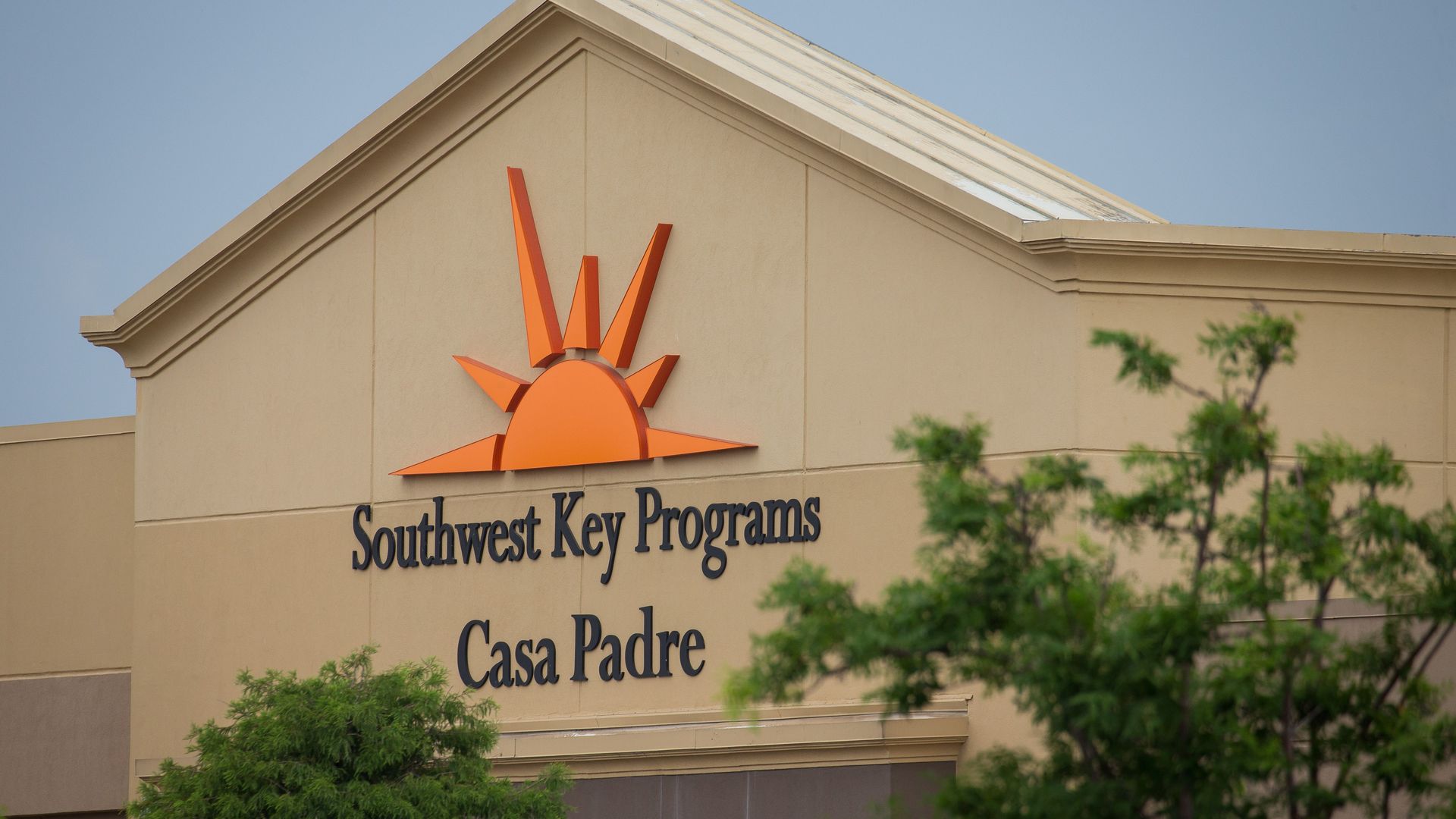 A building that reads, "Southwest Key Programs Casa Padre" 