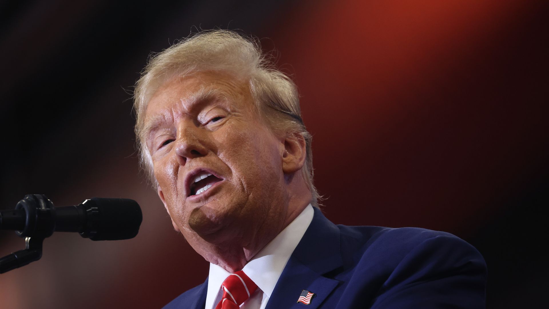 Republican presidential candidate former President Donald Trump speaks to guests during a rally at Clinton Middle School on January 06, 2024 in Clinton, Iowa. 