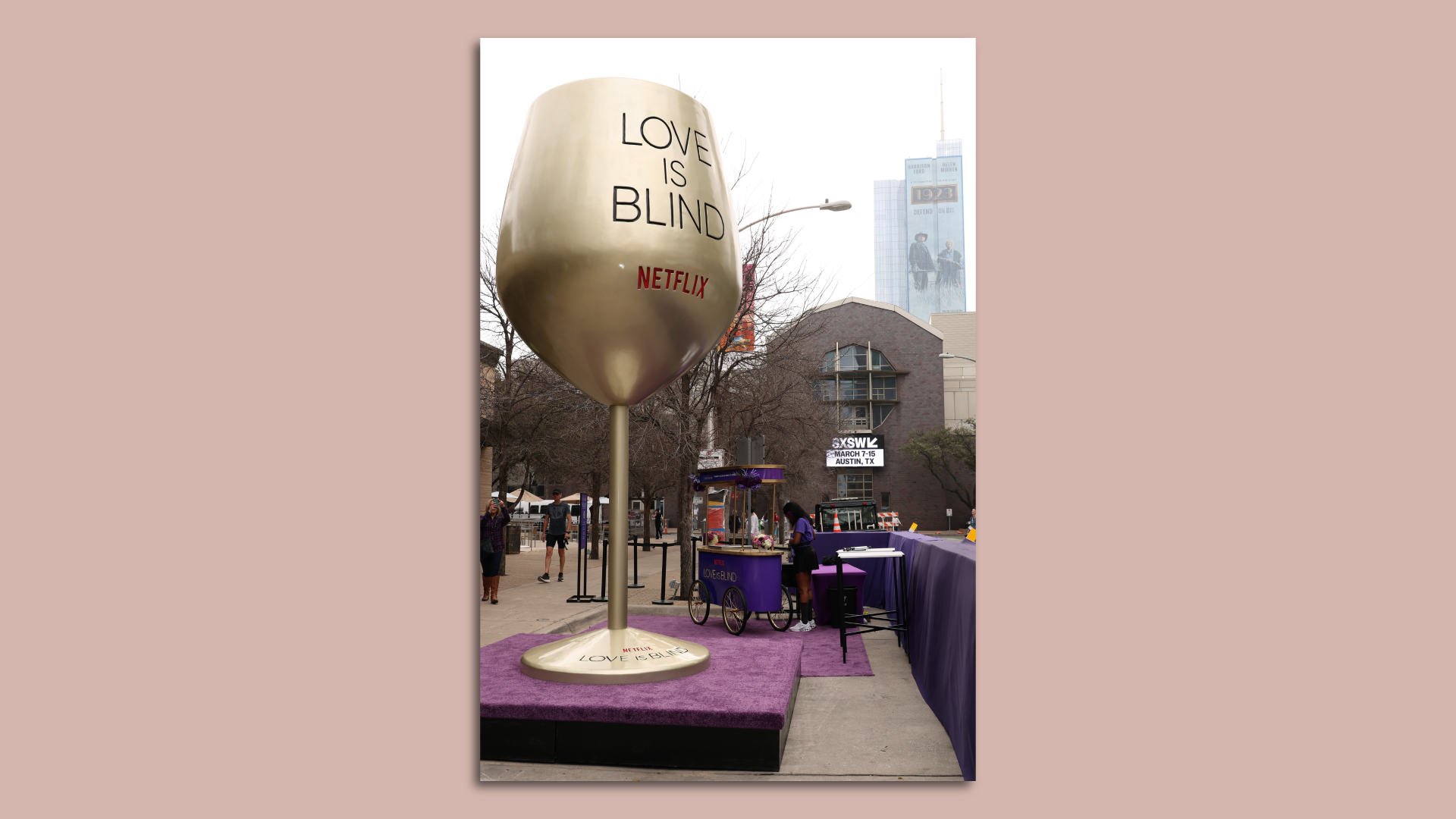 A large golden goblet on a pedestal that reads "Love is Blind Netflix."