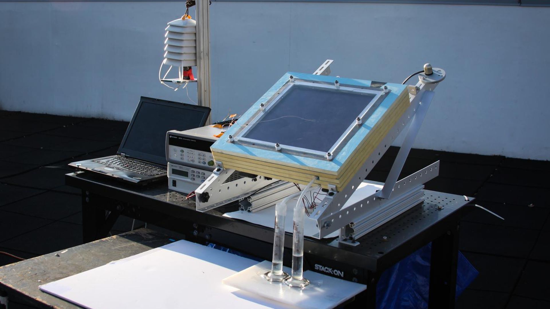 prototype of the new two-stage water harvesting system tested on an MIT rooftop.