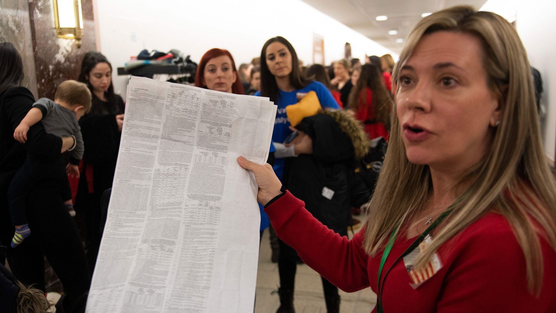 A parent protesting vaccinations outside a recent U.S. Senate committee hearing