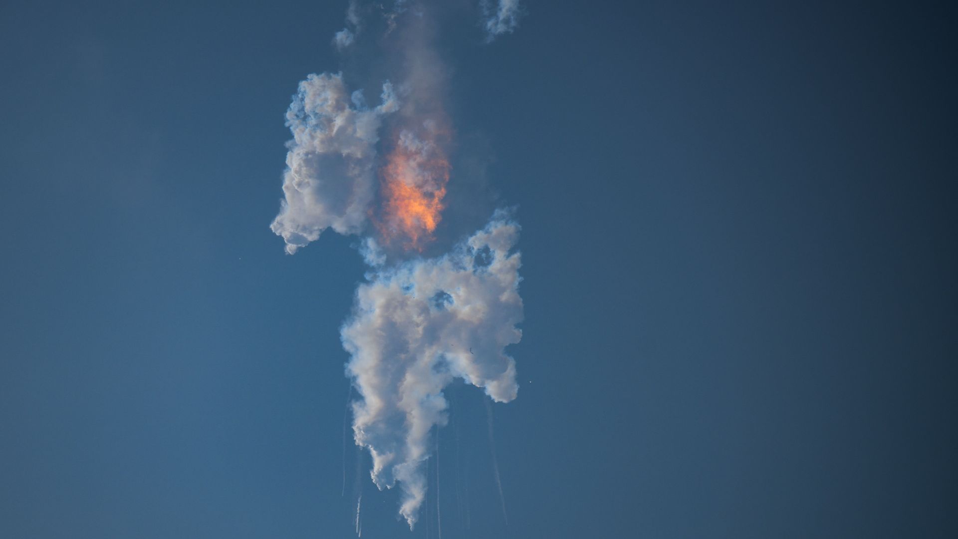 A fireball in the sky that was the result of SpaceX's Starship exploding shortly after launch