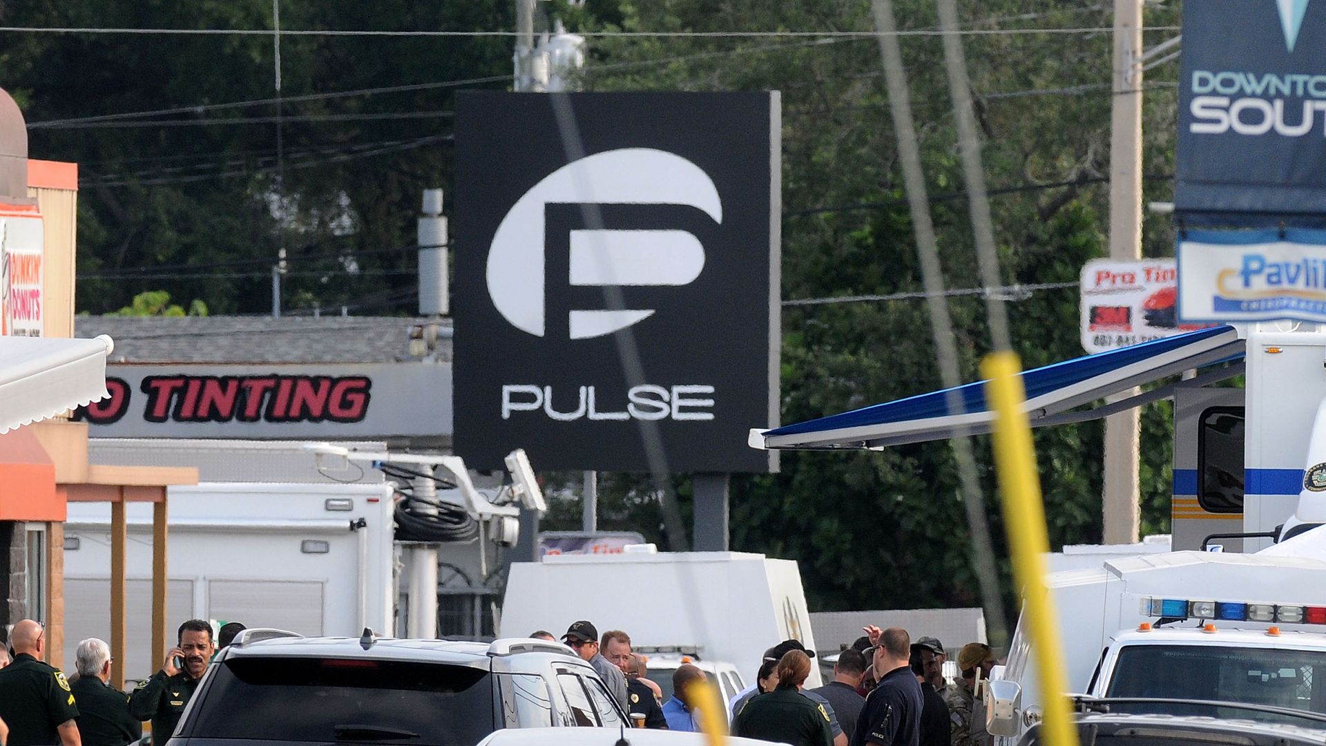  Orlando police officers seen outside of Pulse nightclub after a fatal shooting and hostage situation on June 12, 2016 in Orlando, Florida.