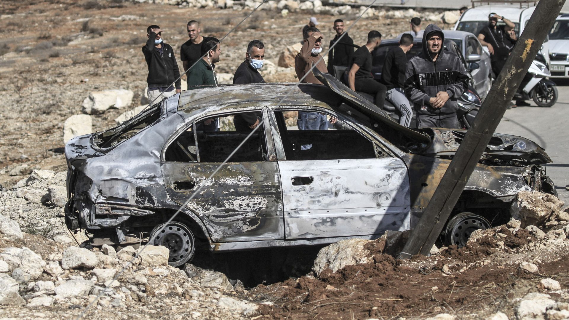 A view of a burnt Palestinian car after it was set on fire by settlers during a settler attack on the town of Beit Furik, east of Nablus in the occupied West Bank. 