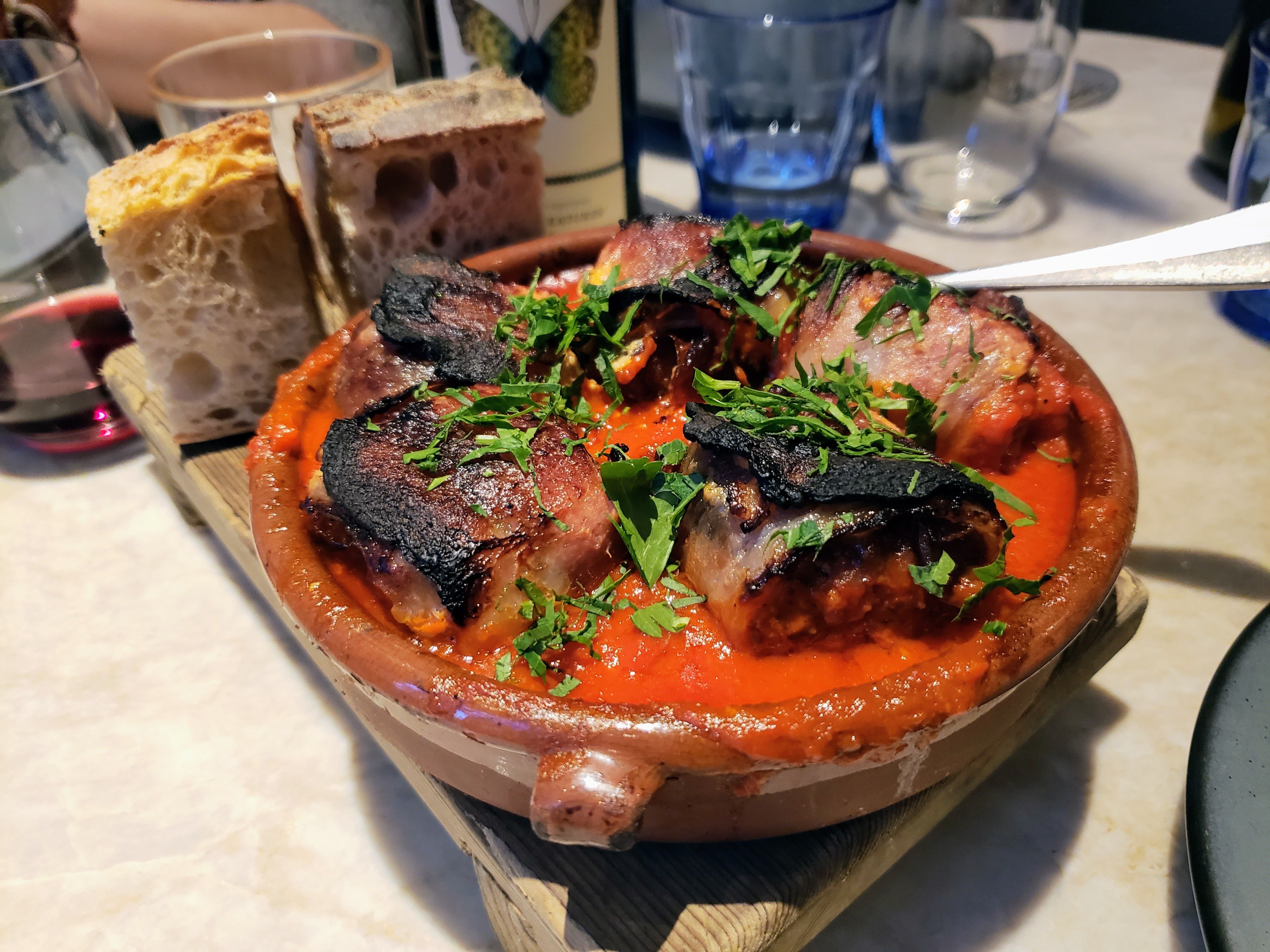 dish of dates and tomato sauce 