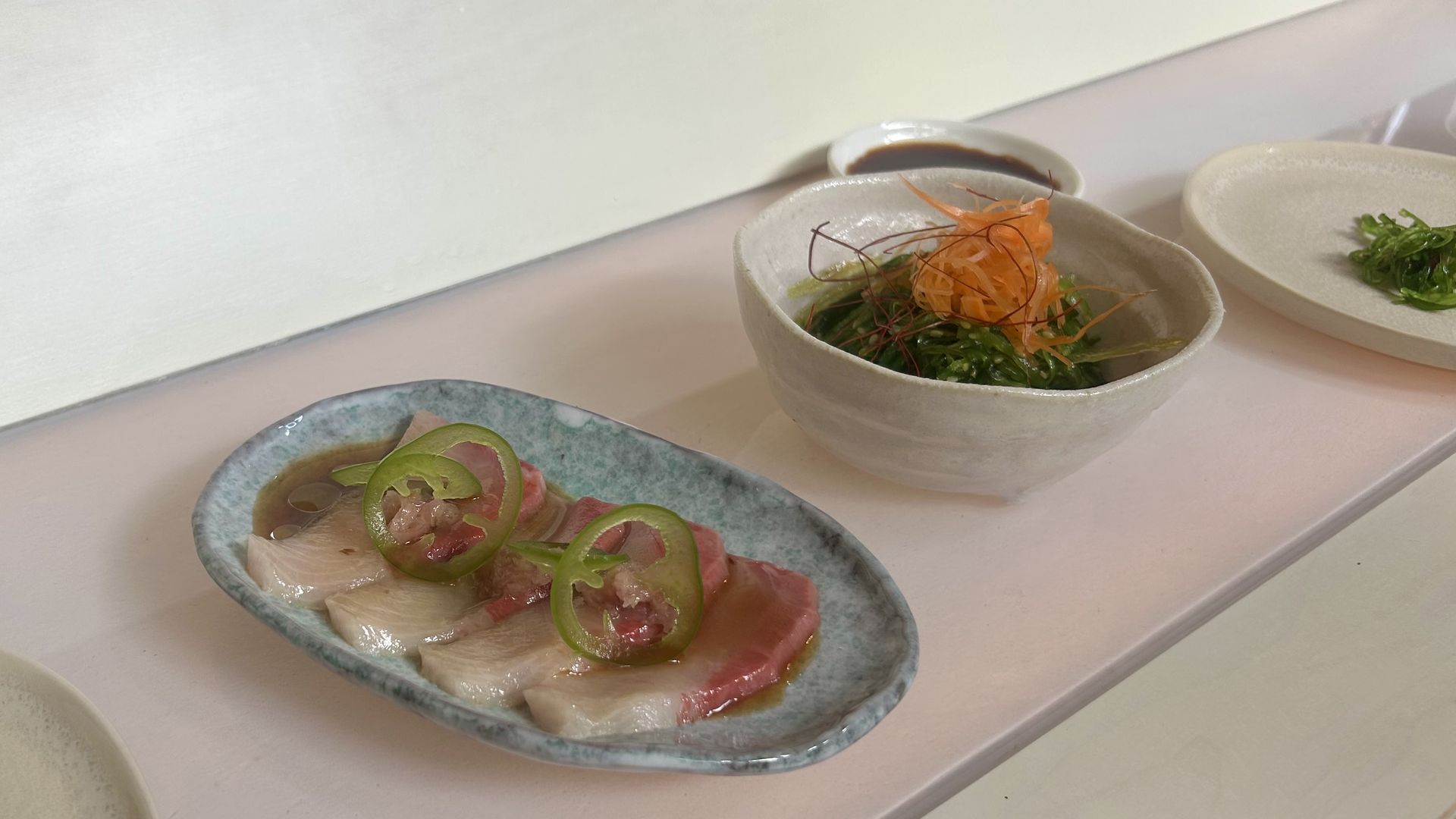 Hamachi jalapeno with ponzu and seaweed carrot salad. 