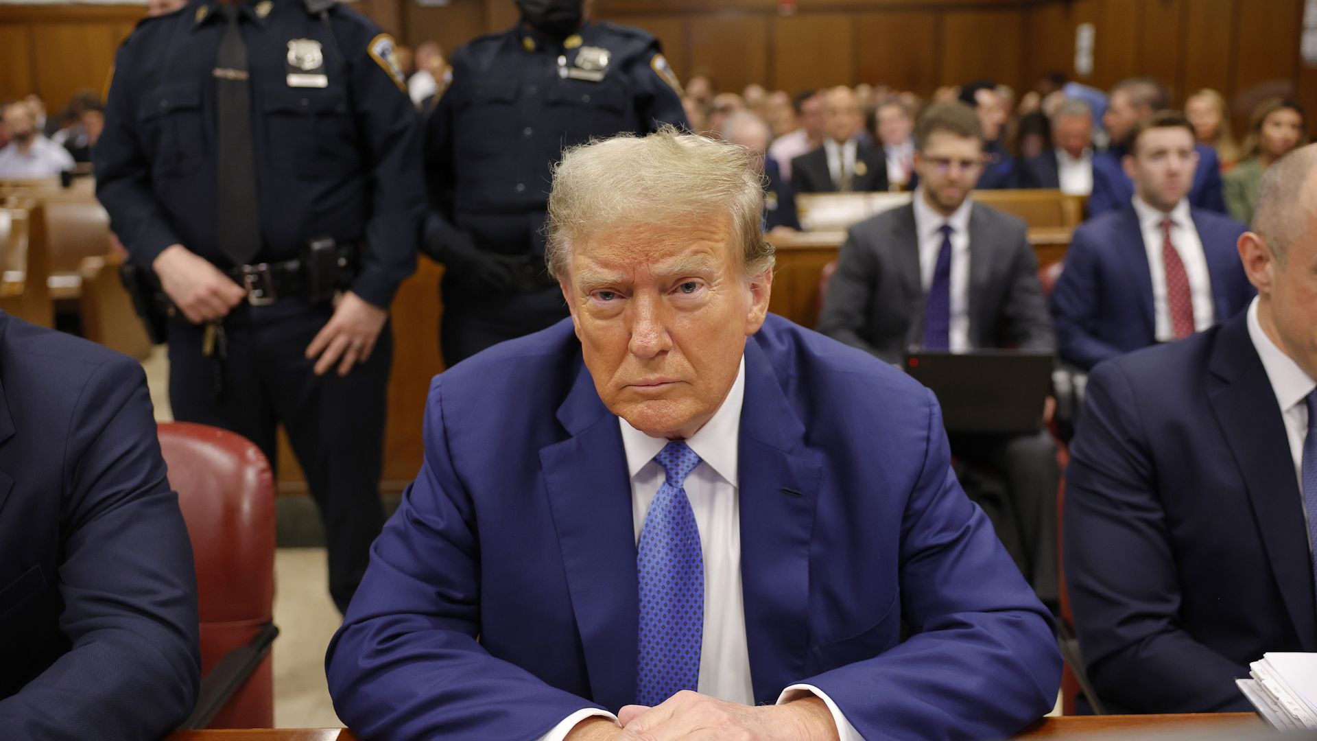 Former U.S. President Donald Trump sits in the courtroom during his hush money trial at Manhattan Cr