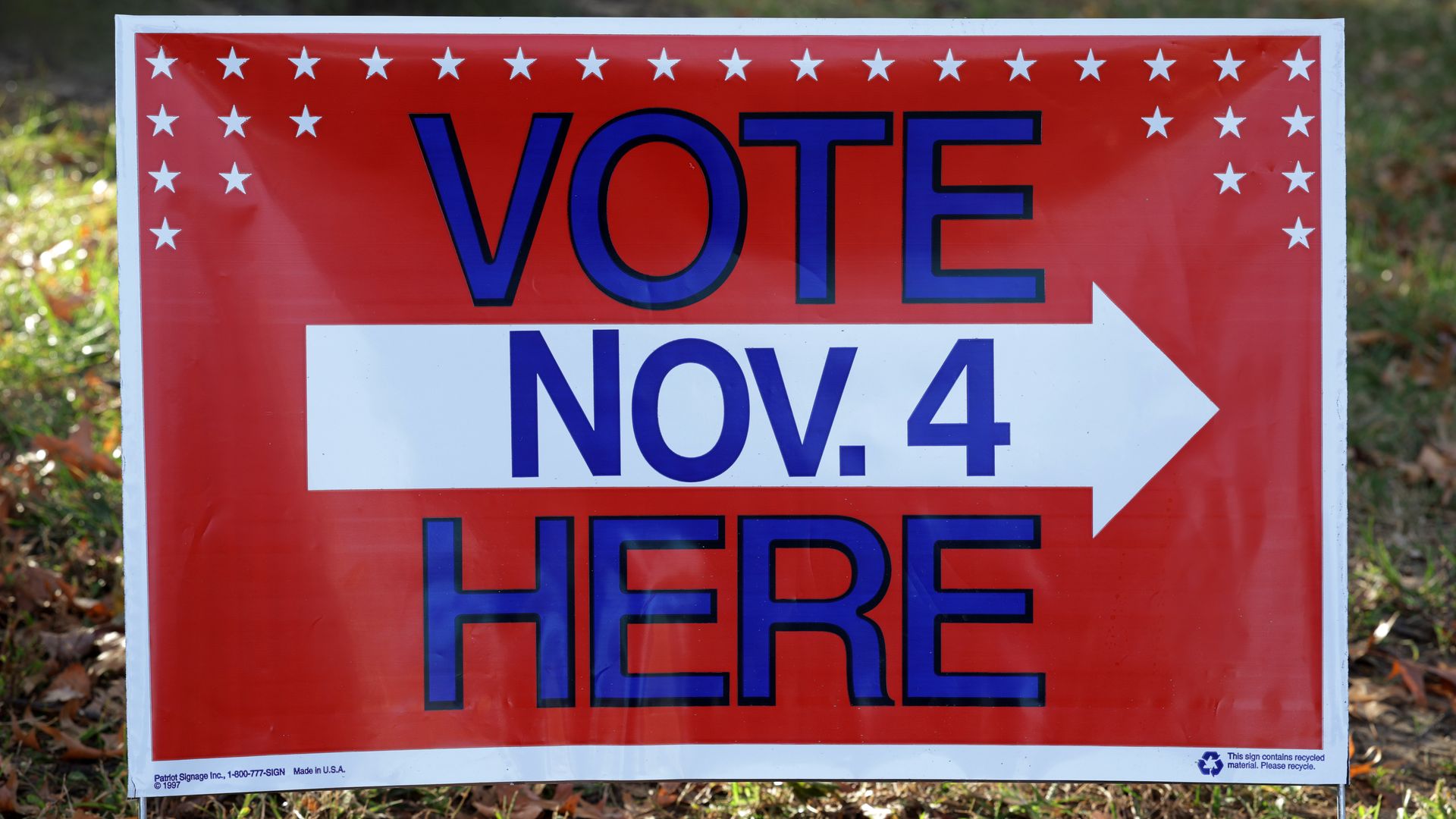 A "Vote Here" sign stands outside a polling station in Alexandria, Virginia, on Election Day.