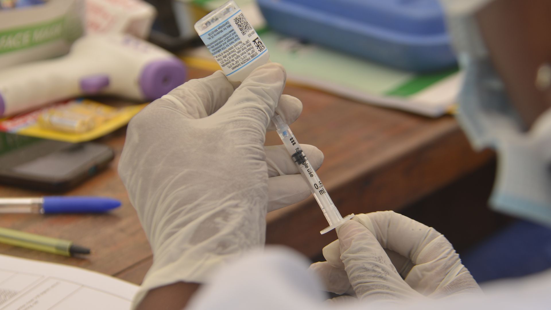 A medic prepares a dose of the Moderna Covid-19 corononavirus at the Oregun Primary Health Care Center in Ikeja capital of Lagos on August 25, 2021.