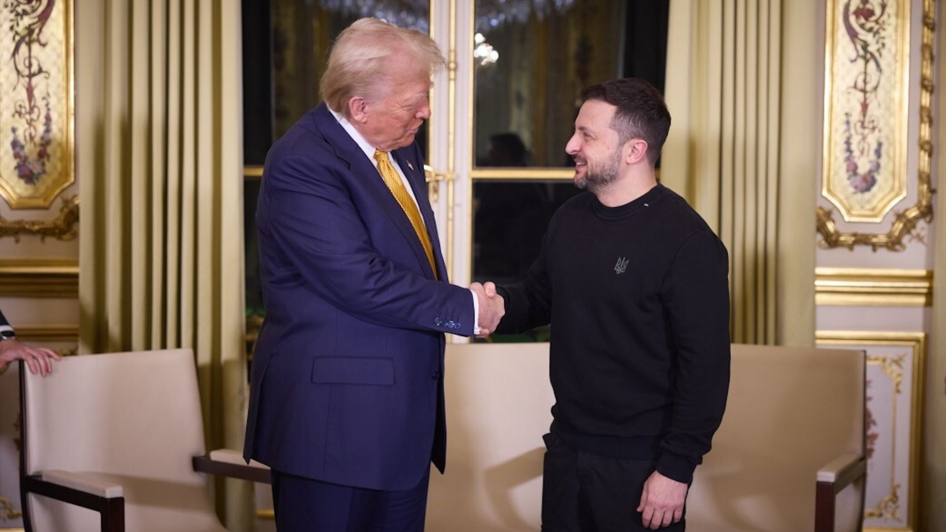 President Trump and Ukrainian President Volodymyr Zelensky meet at the Elysee Palace in Paris last December.