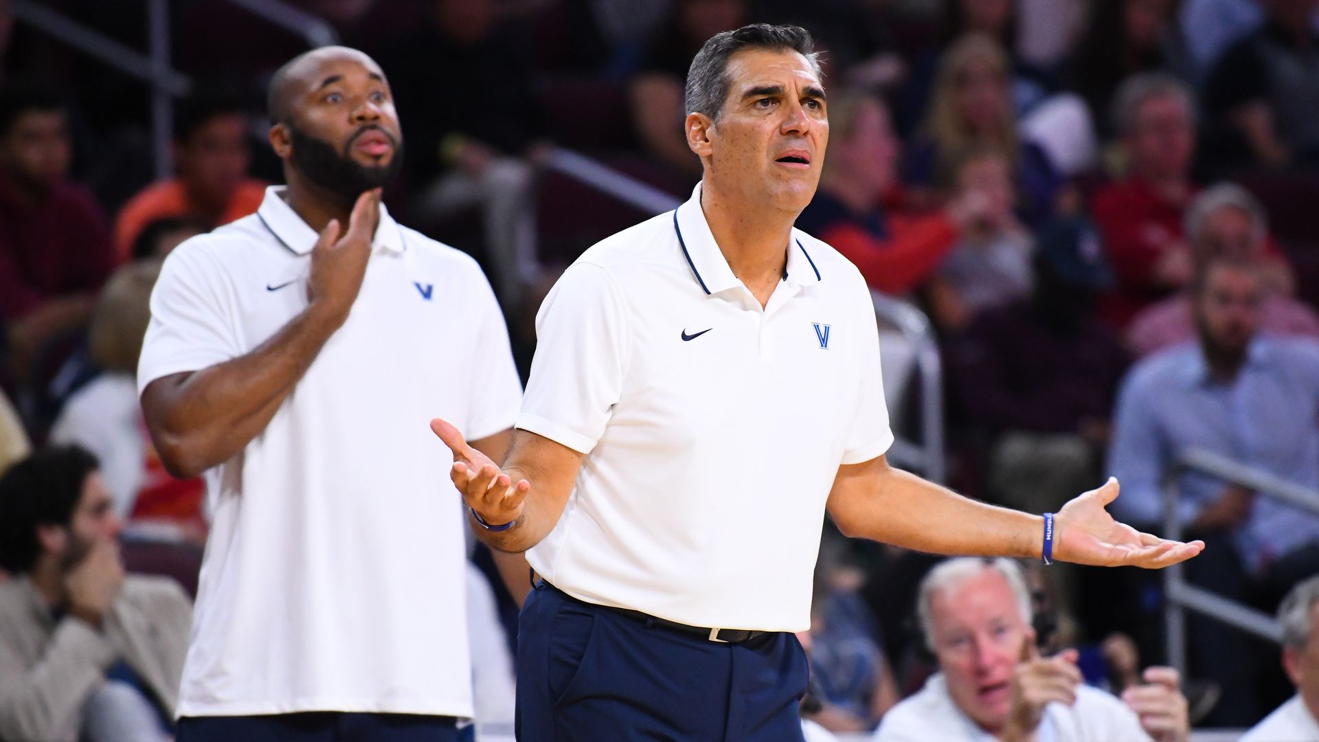 Jay Wright in a collared shirt
