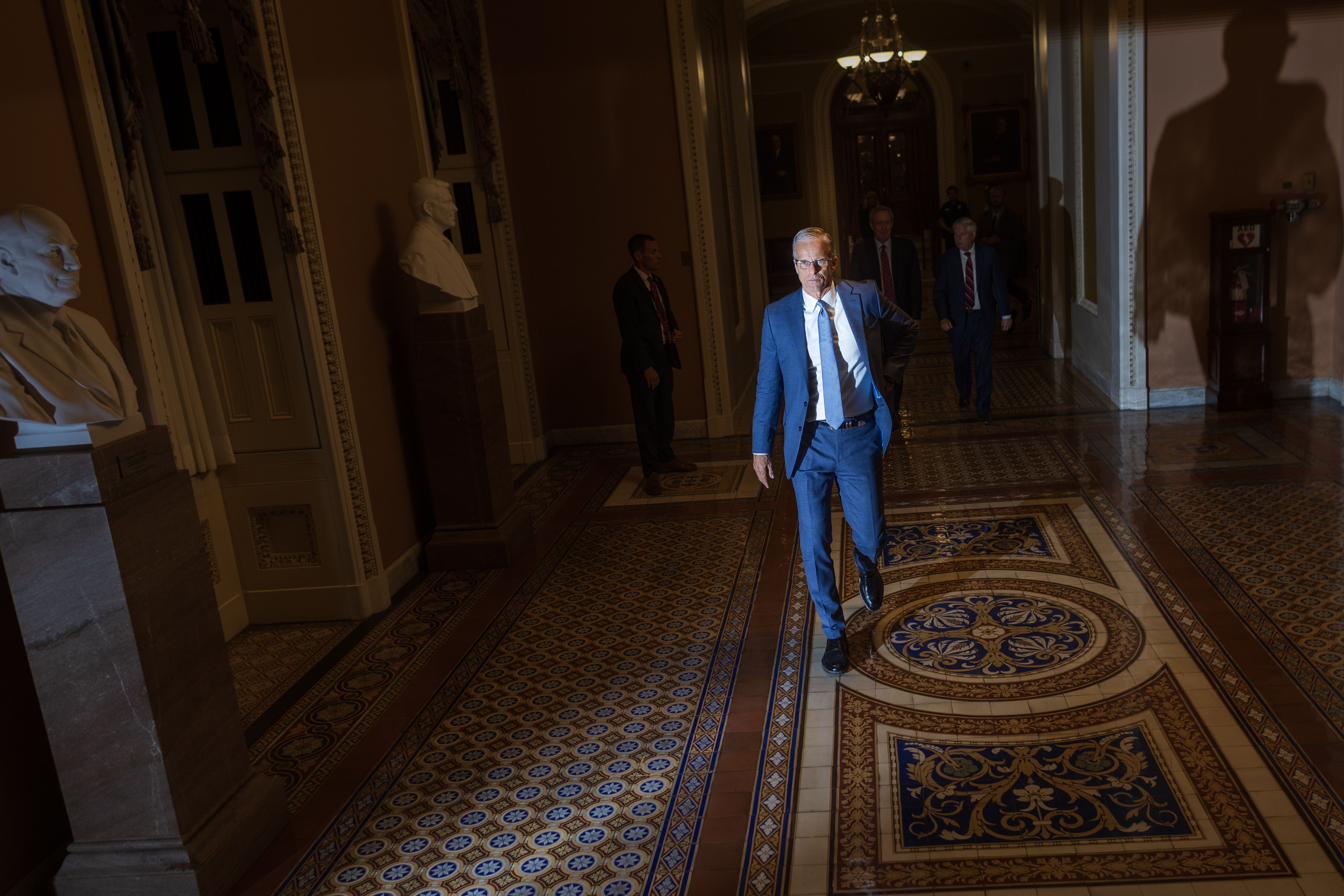 Senate Majority Leader John Thune walks into his office on Capitol Hill last week.