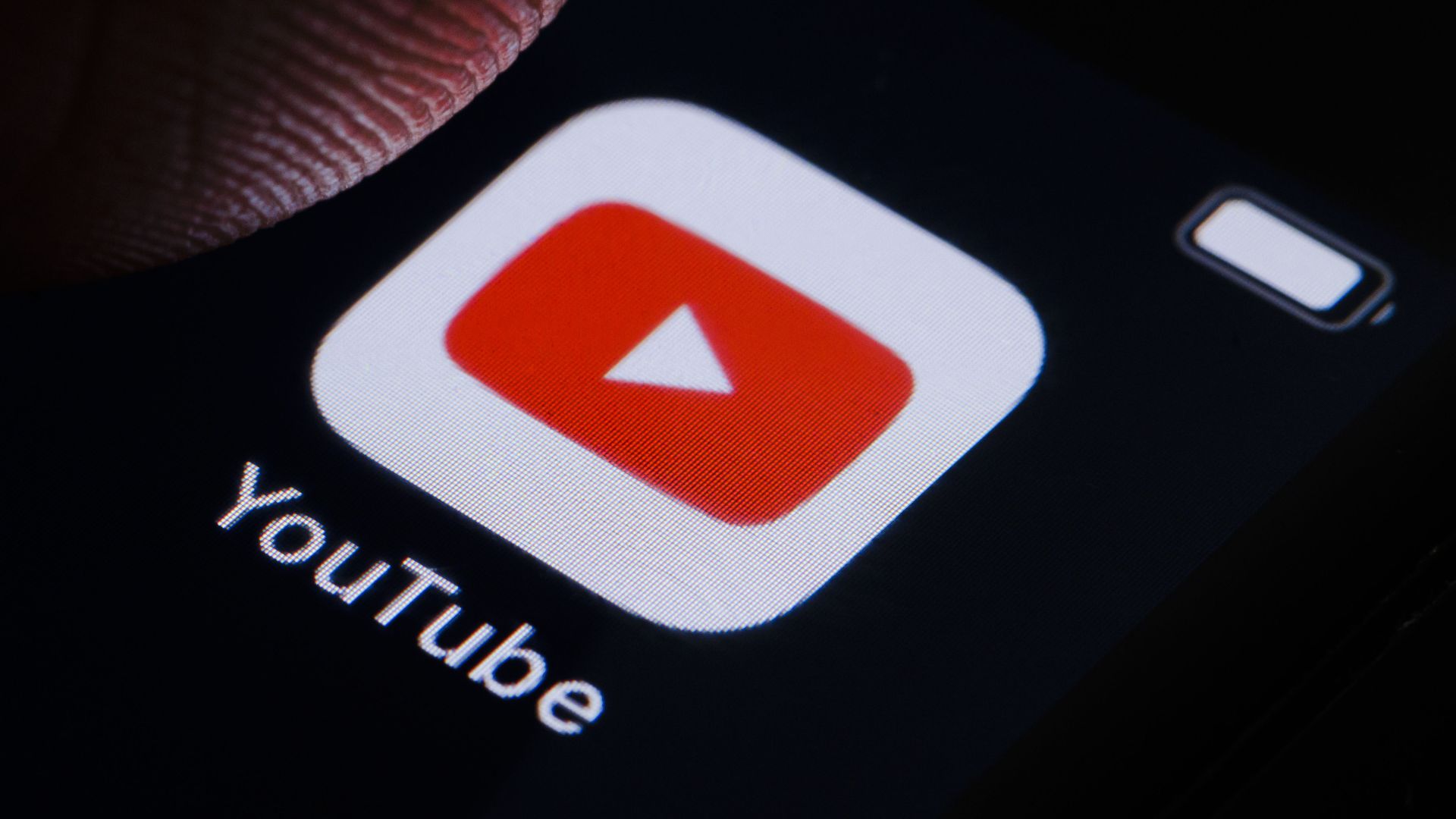 In this photo illustration the logo of YouTube can be seen on a smartphone on March 10, 2022 in Berlin, Germany. 