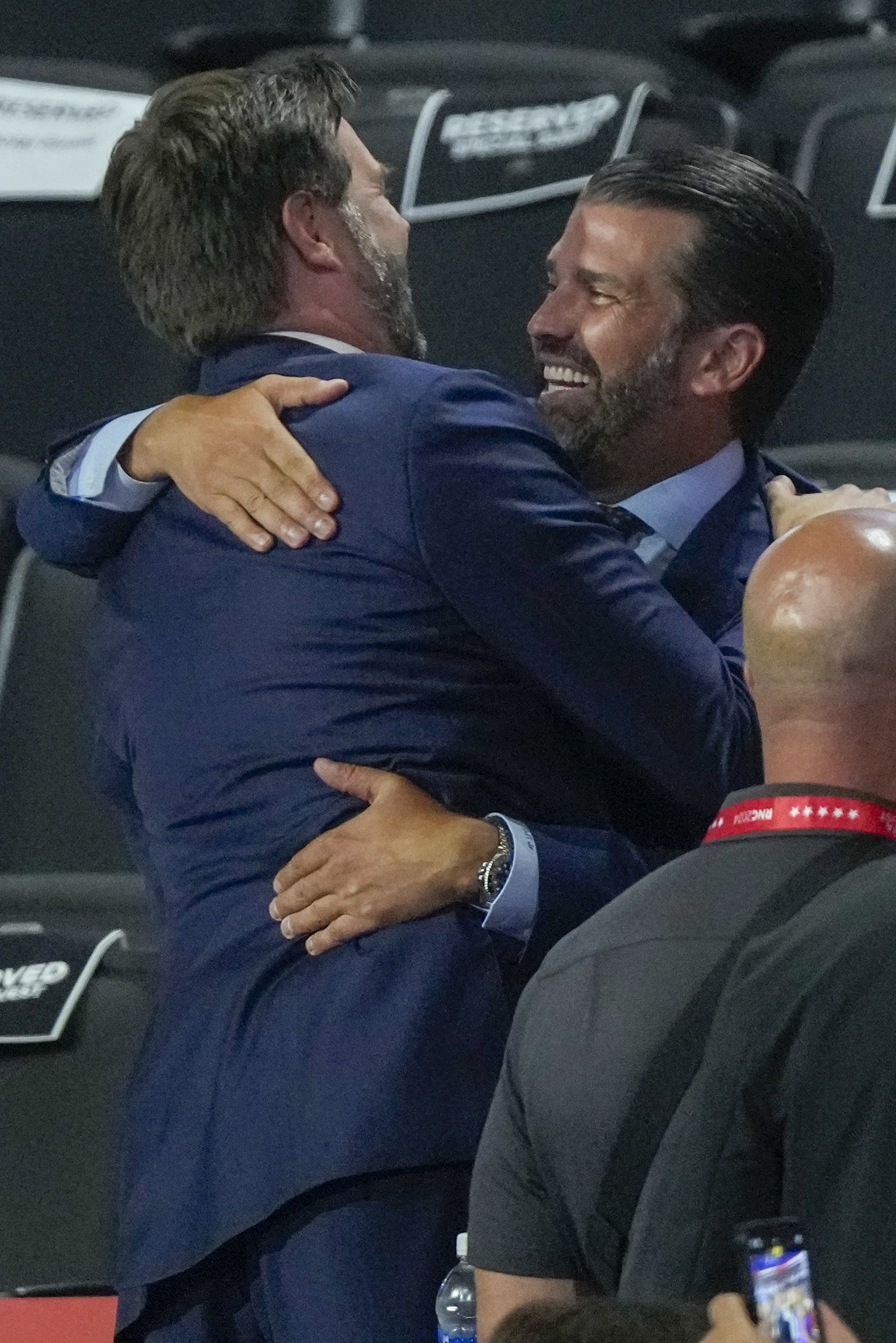 Republican vice presidential candidate Sen. JD Vance, R-Ohio, and Donald Trump Jr. embrace during the RNC yesterday.