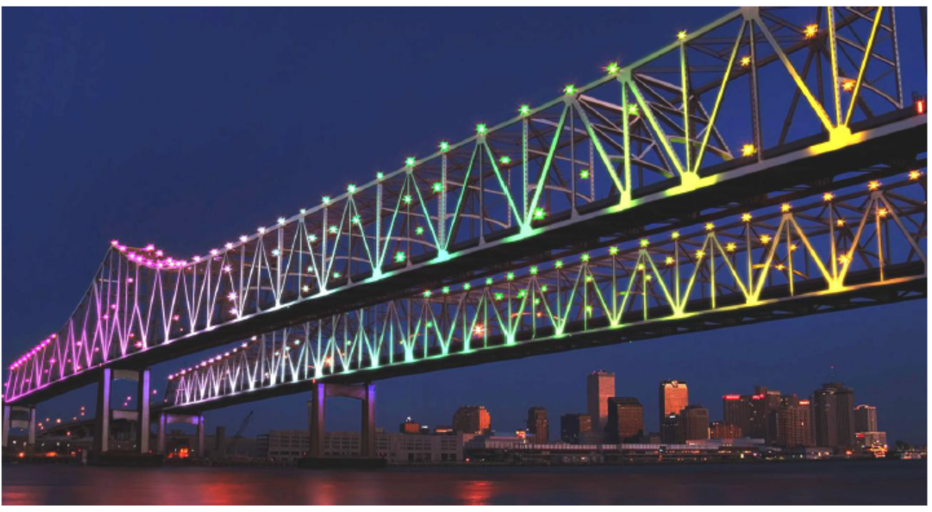 Image shows a rendering of the Crescent City Connection with multi-colored lights.