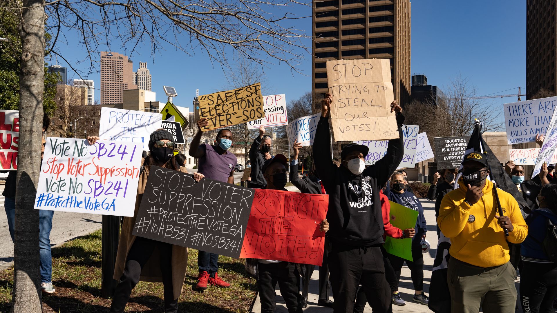 Demonstrators in Georgia protest voting restrictions in early March.