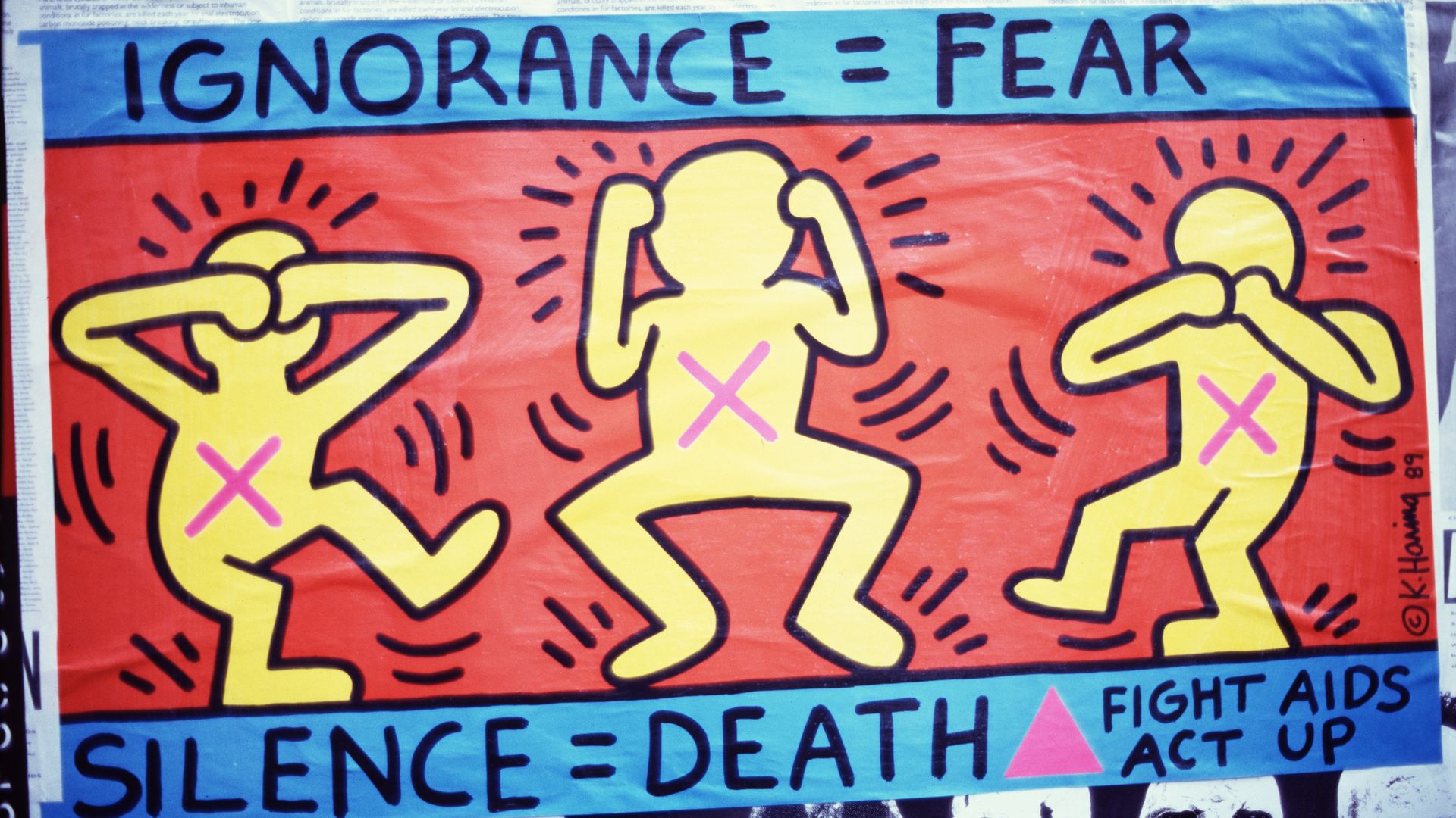 A colorful AIDS activism poster by Keith Haring with three yellow outlined figures on a red background, each marked with pink X's. Text reads "IGNORANCE = FEAR" and "SILENCE = DEATH."