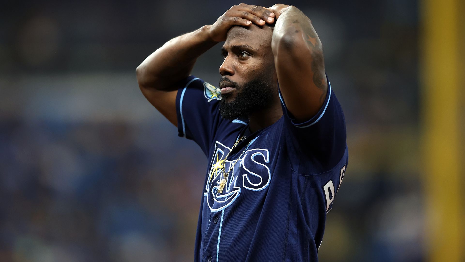 Rand Arozarena with his hands on his head