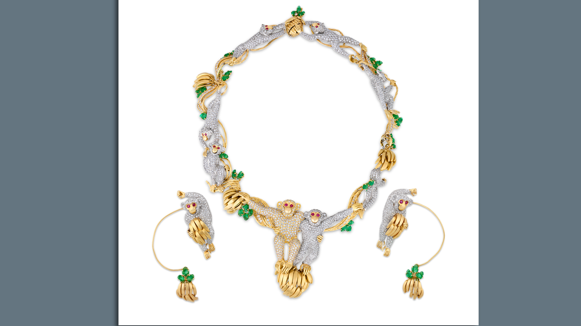 Photo shows a monkey necklace and matching earrings.