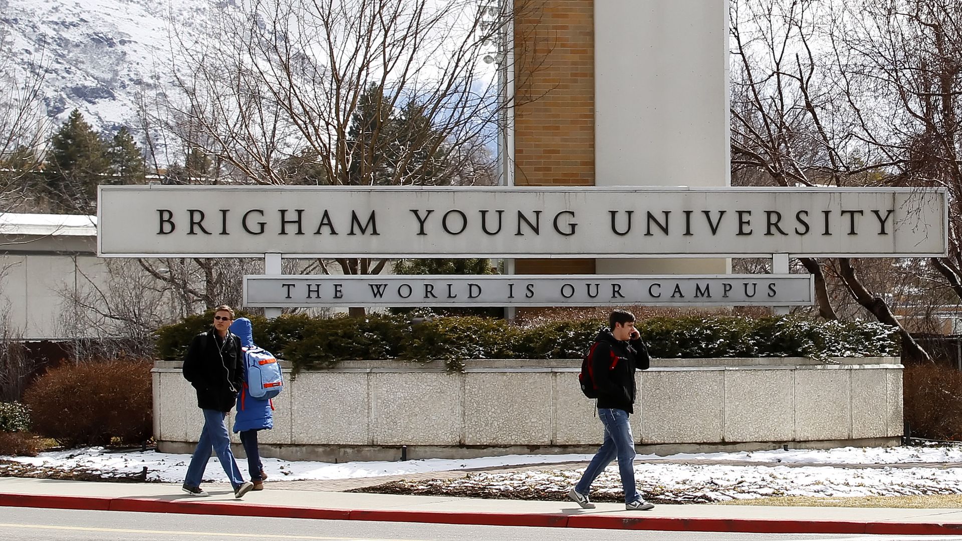 Signs read "Brigham Young University" and "The world is our campus." 
