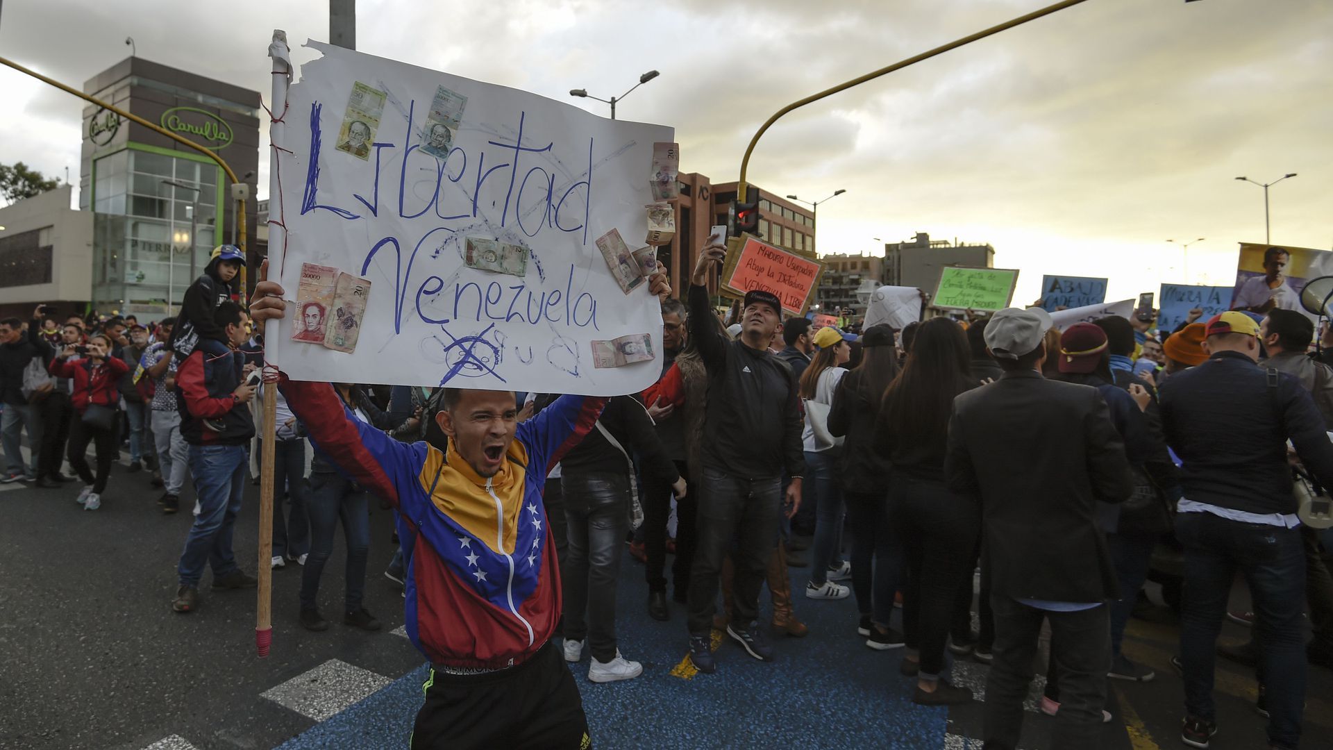 Protestors to President Nicolas Maduro hold demonstration in Bogota, Colombia, on Jan. 23. 