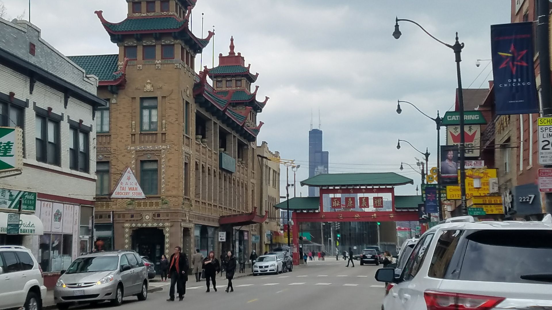 Photo of a street of buildings and restaurants