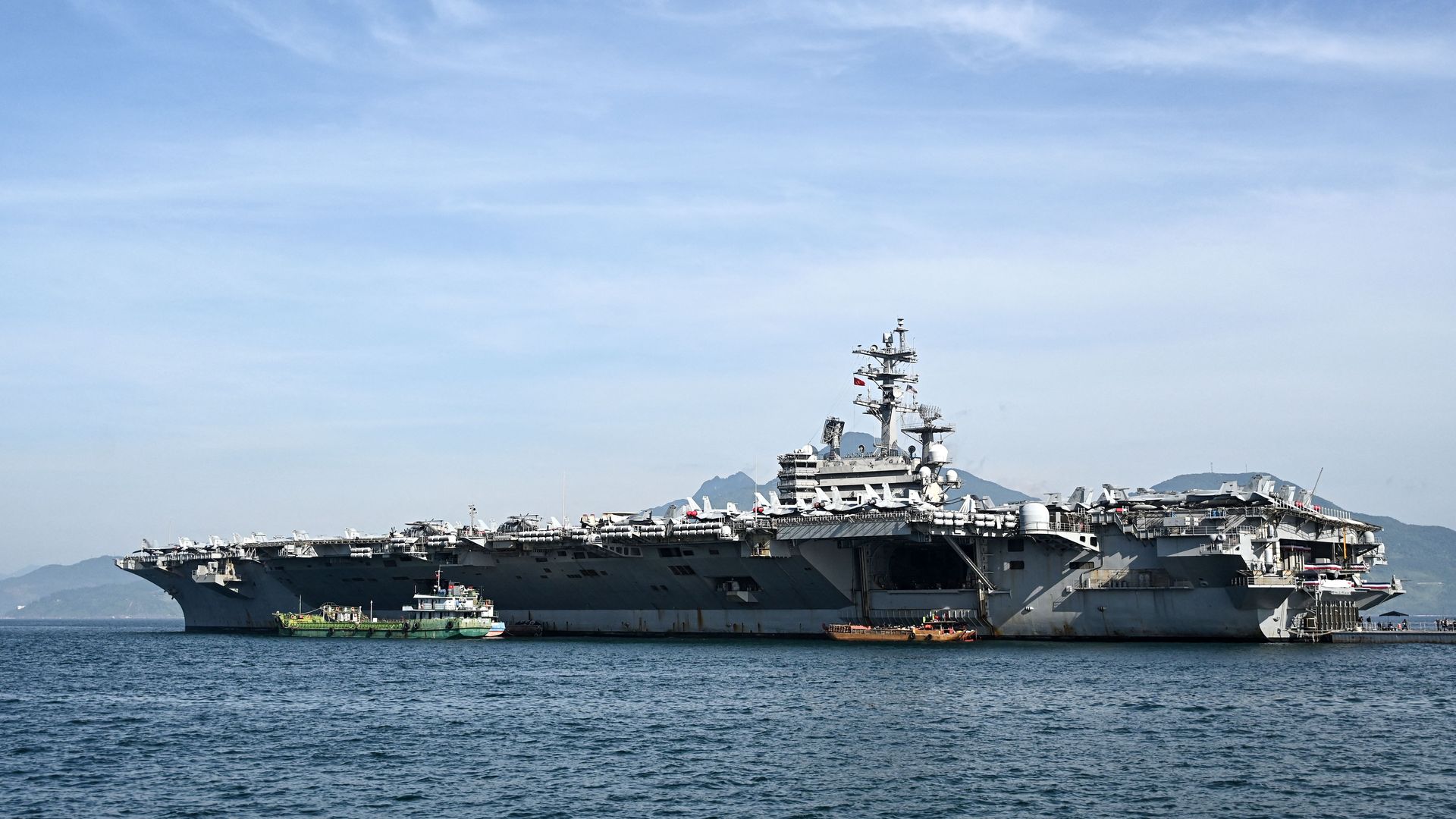 The USS Ronald Reagan, a US Navy Nimitz-class nuclear-powered aircraft carrier, is seen docked at the port during a visit in Danang on June 26