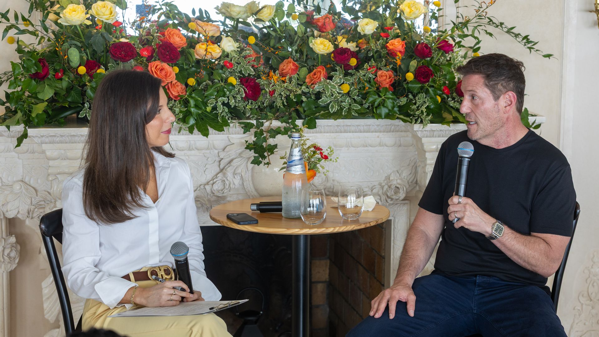 Axios media correspondent Sara Fischer and Candle Media co-CEO Kevin Mayer speak onstage at an Axios event in Cannes, France.