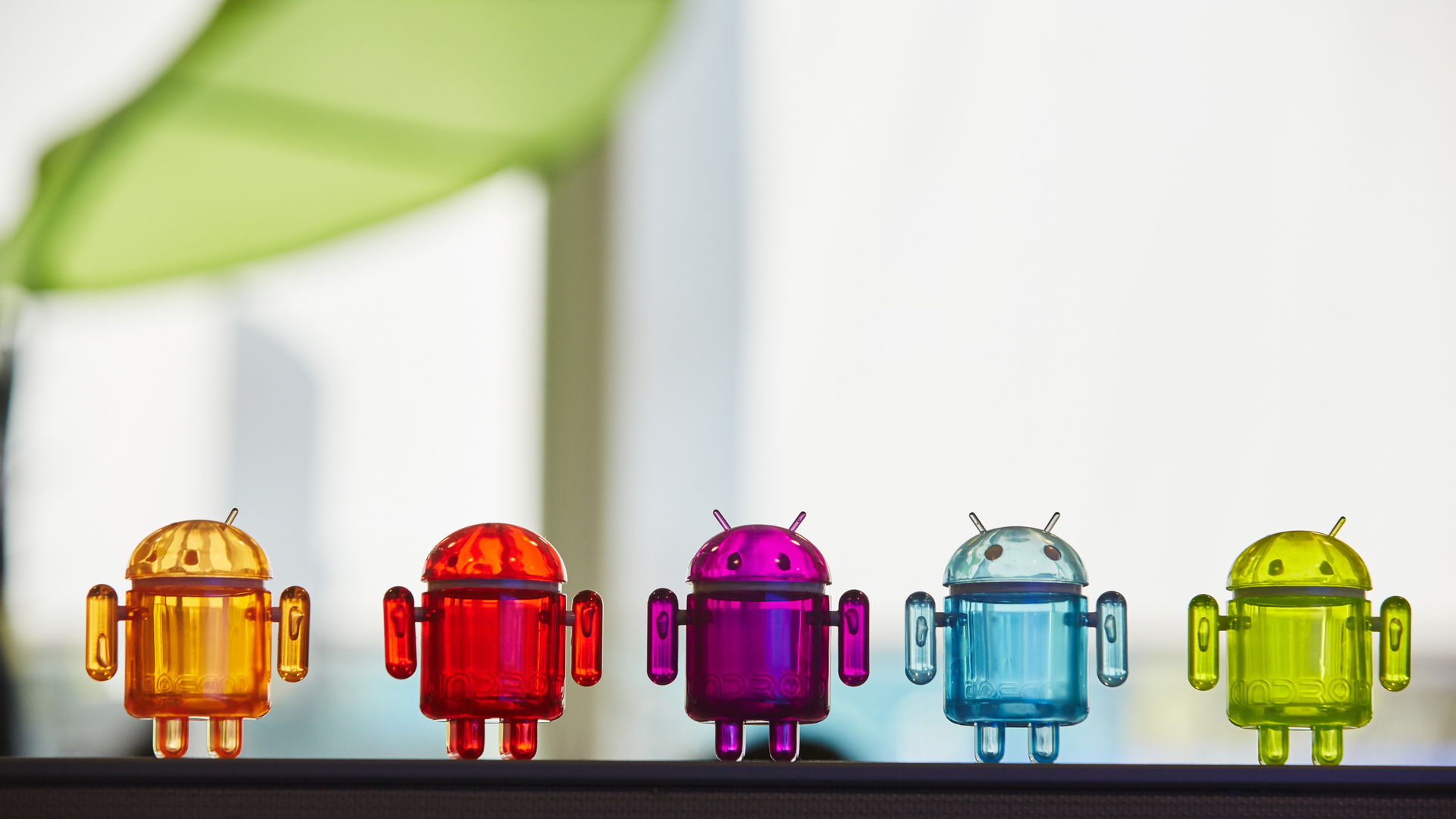 Some of Google's colorful Android toys as seen in a window