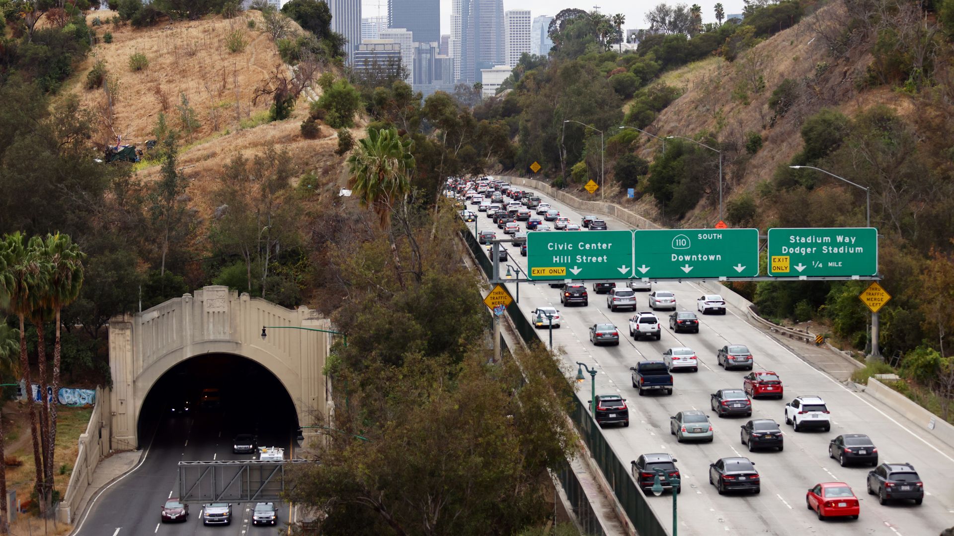 Cars make their way toward downtown L.A. during the morning commute on April 22, 2021 in Los Angeles