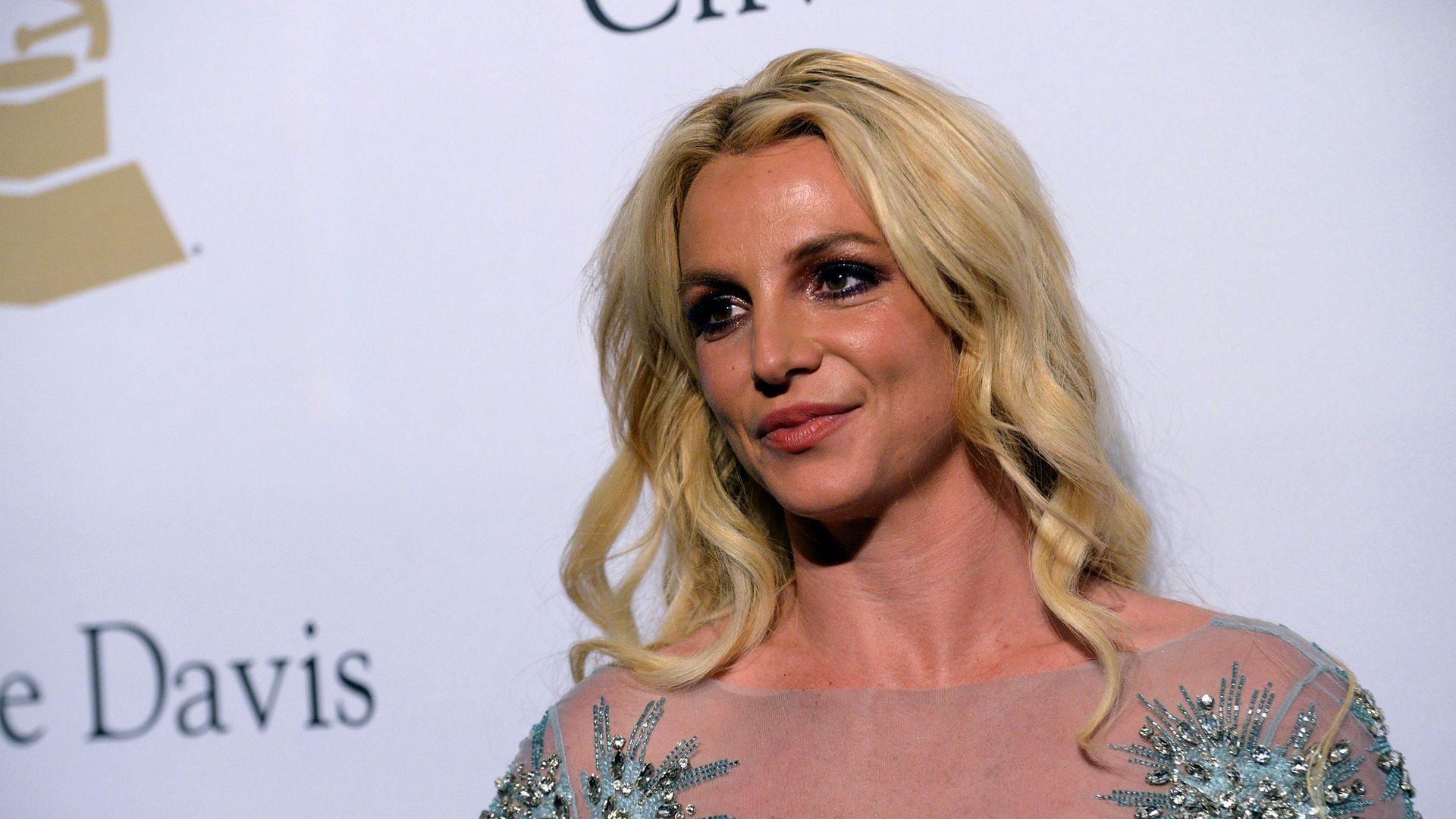 Photo of Britney Spears in a silver dress