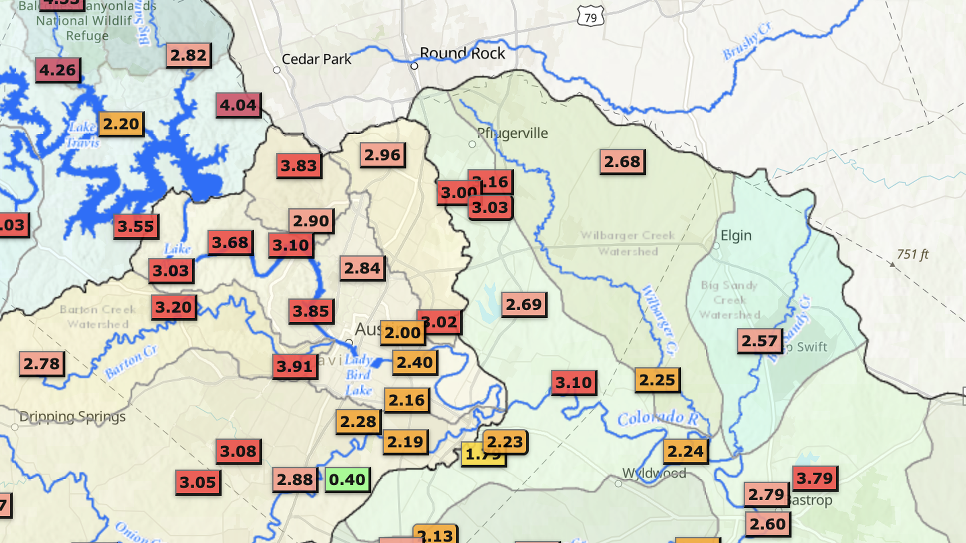 Map of central Texas around Round Rock and Pflugerville, with blue rivers and lakes, town names, and many color-coded value markers (red/orange/yellow/green) showing numbers like 4.53 and 0.40.