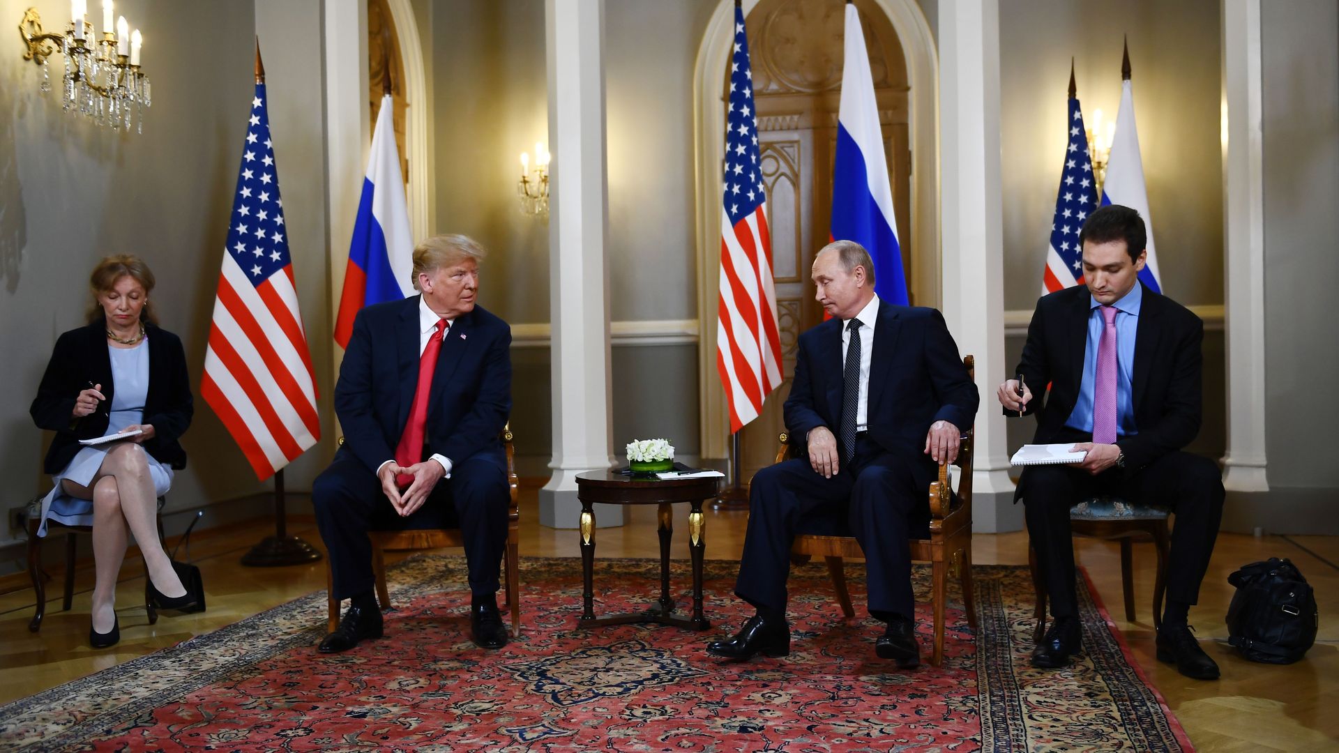 Donald Trump and Vladimir Putin begin meeting in Helsinki. 