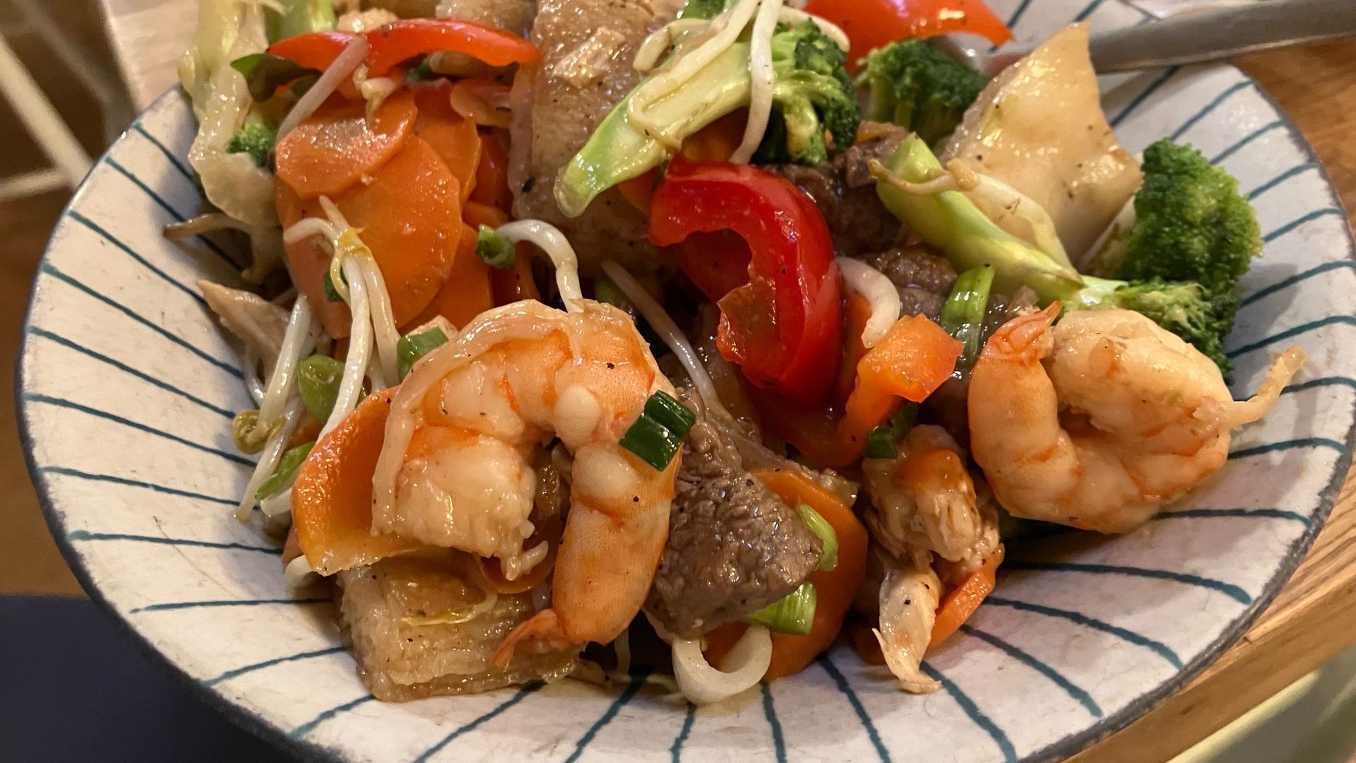 A yummy plate of shrimp, meat, veggies and noodles from Hai Ky.