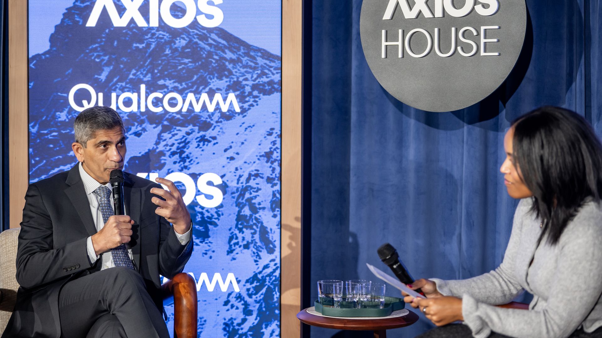 Honeywell CEO Vimal Kapur speaks to Axios senior economics reporter Courtenay Brown on stage at Axios House in Davos.