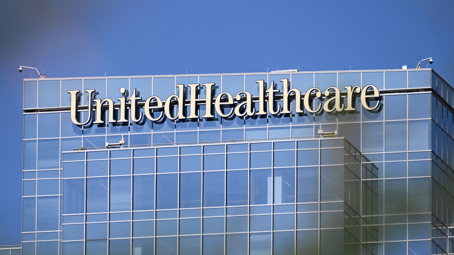 The UnitedHealthcare building in front of a blue sky