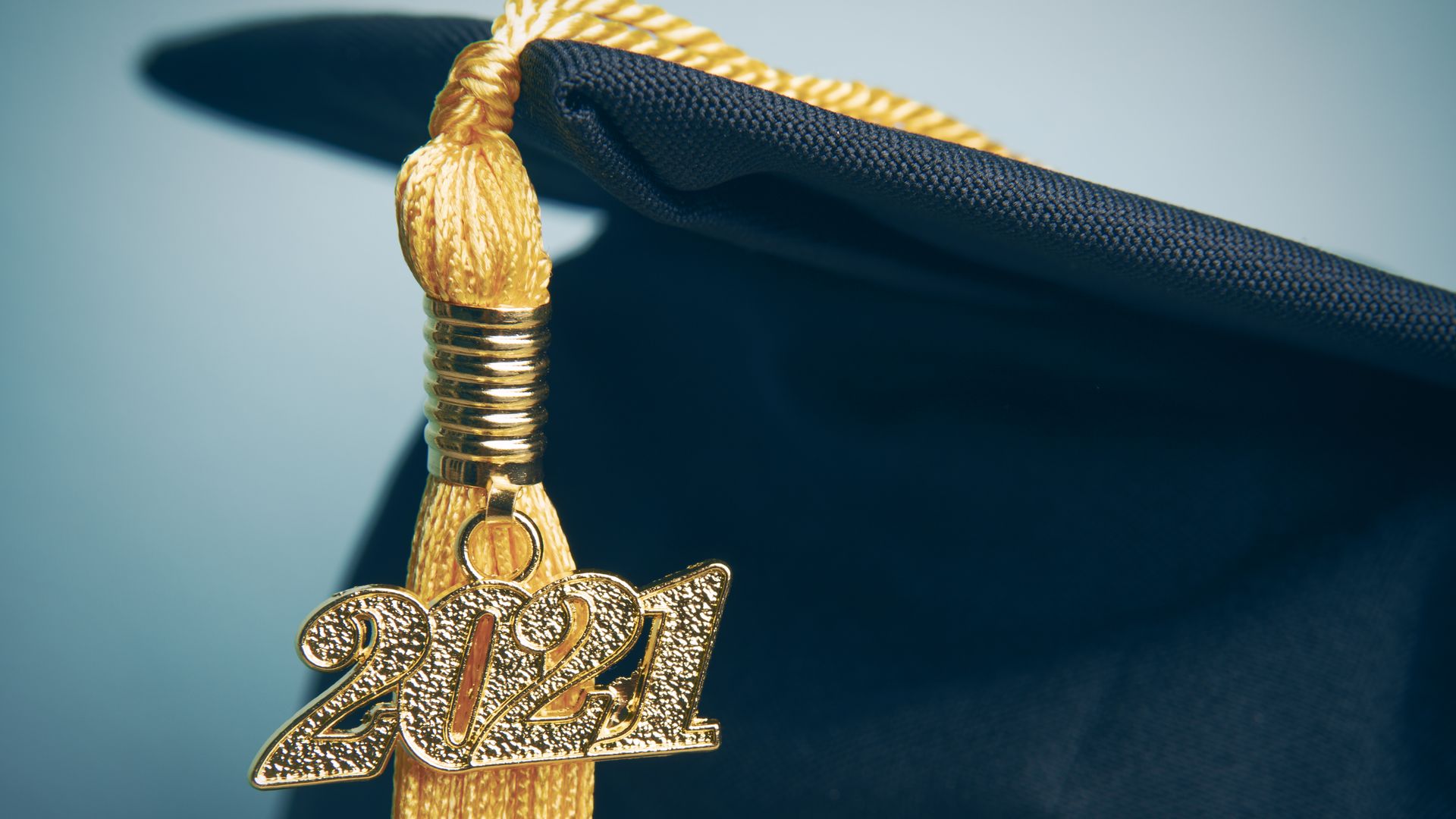 cap and tassel that with a 2021 pin