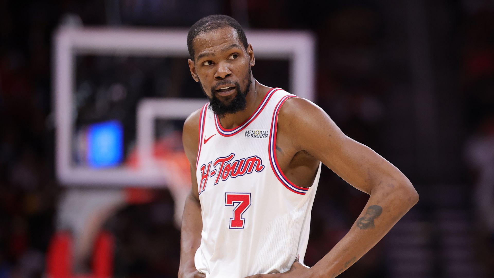 Houston Rockets forward Kevin Durant places his hands on his hips during a game