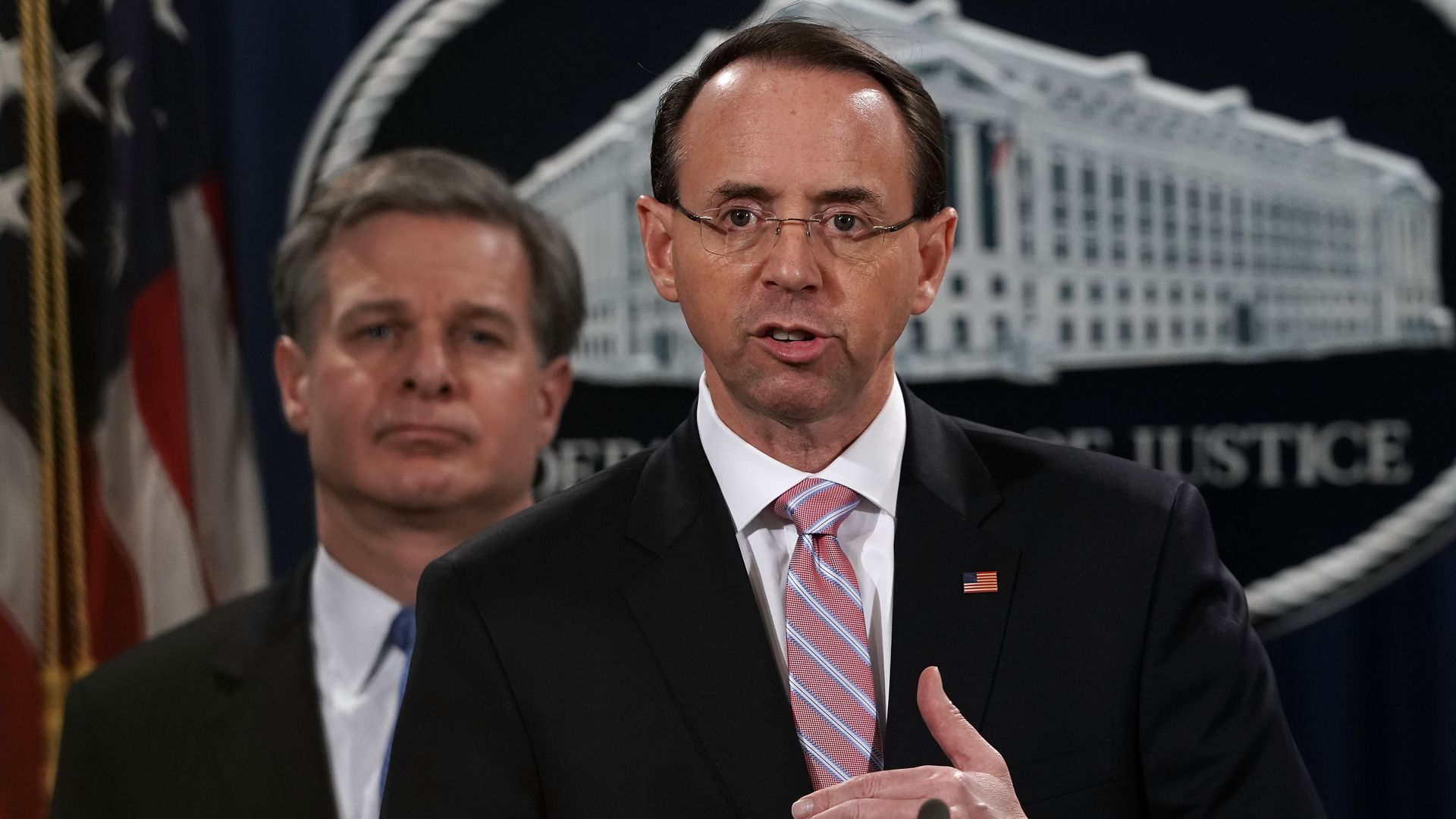 Rod Rosenstein standing at podium
