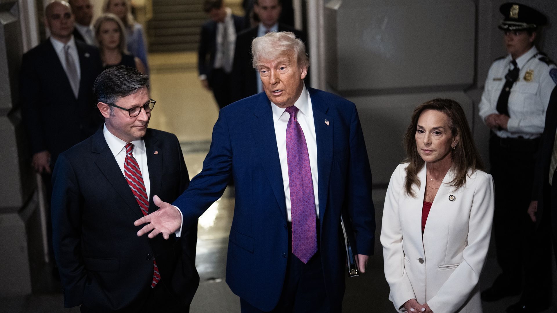 This is Mike Johnson, Donald Trump and Lisa McClain