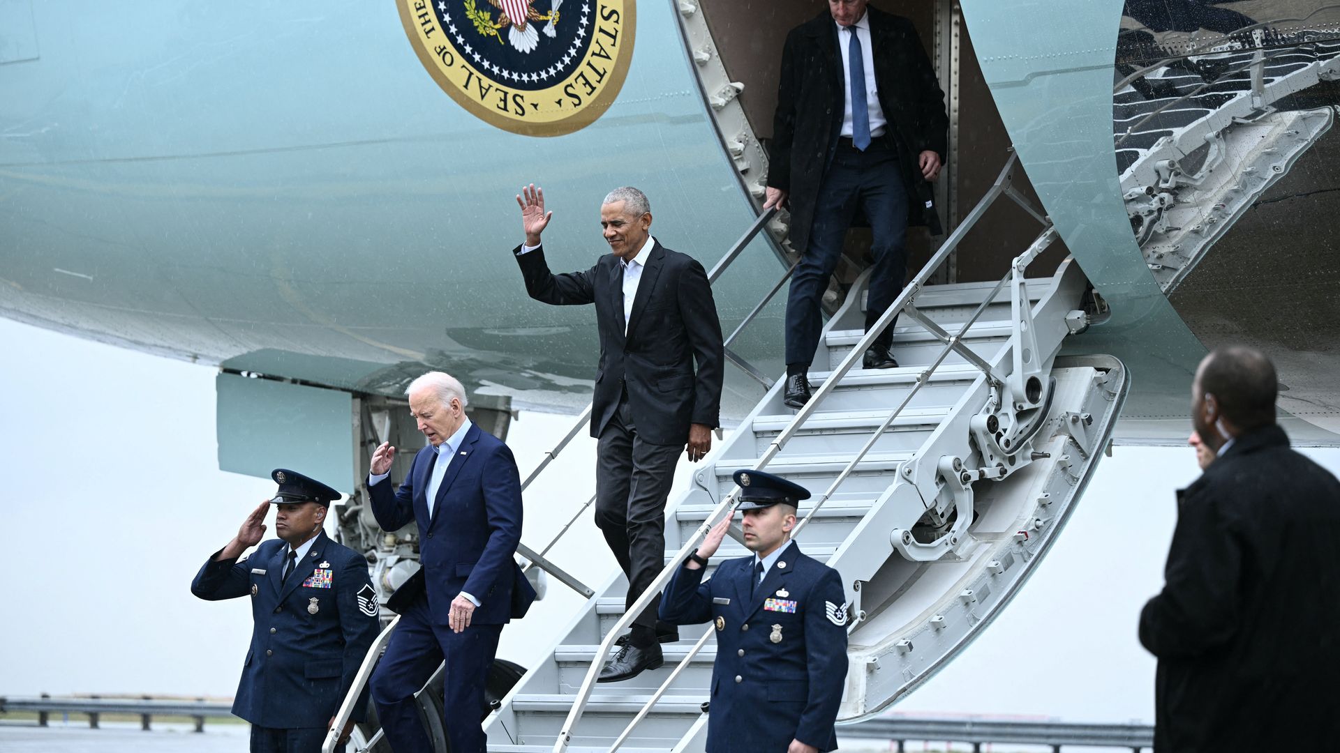 President Biden and former President Obama exiting Air Force One in New York City on March 28.