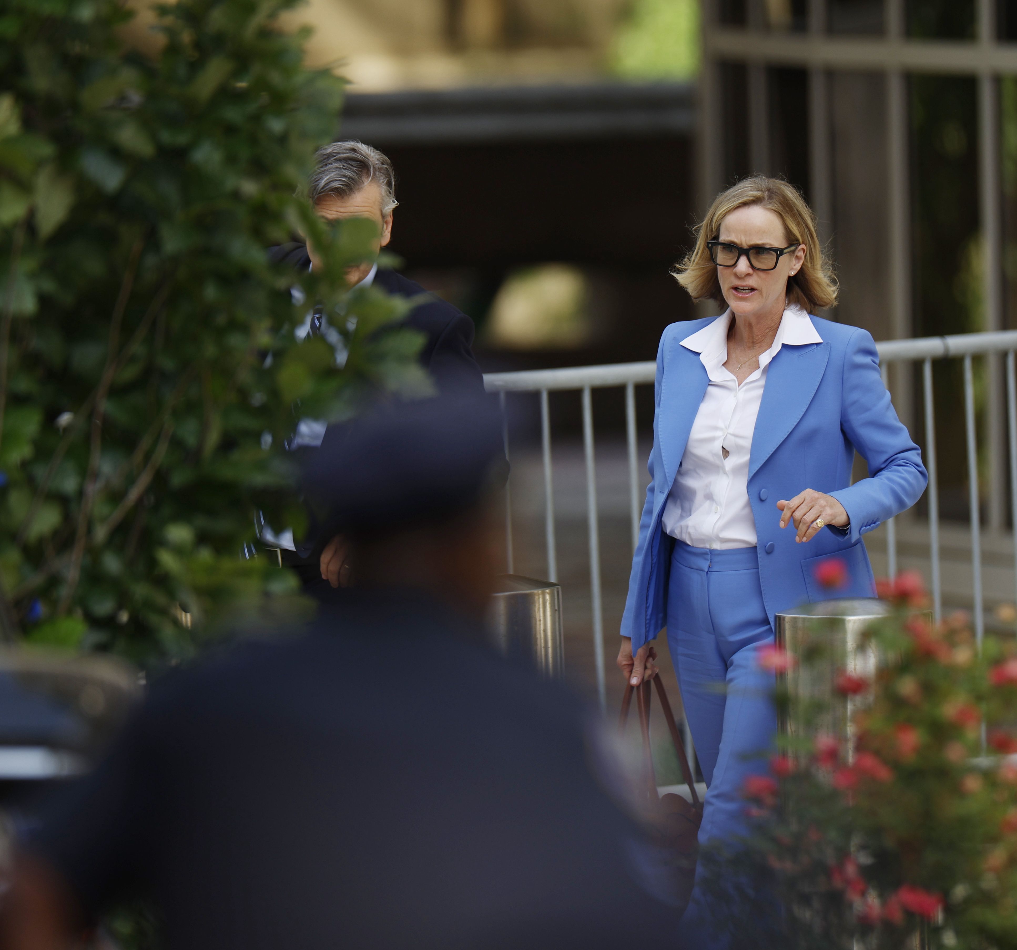 Kathleen Buhle — Hunter Biden's ex-wife — exits the federal courthouse in Wilmington, Del., on Tuesday.