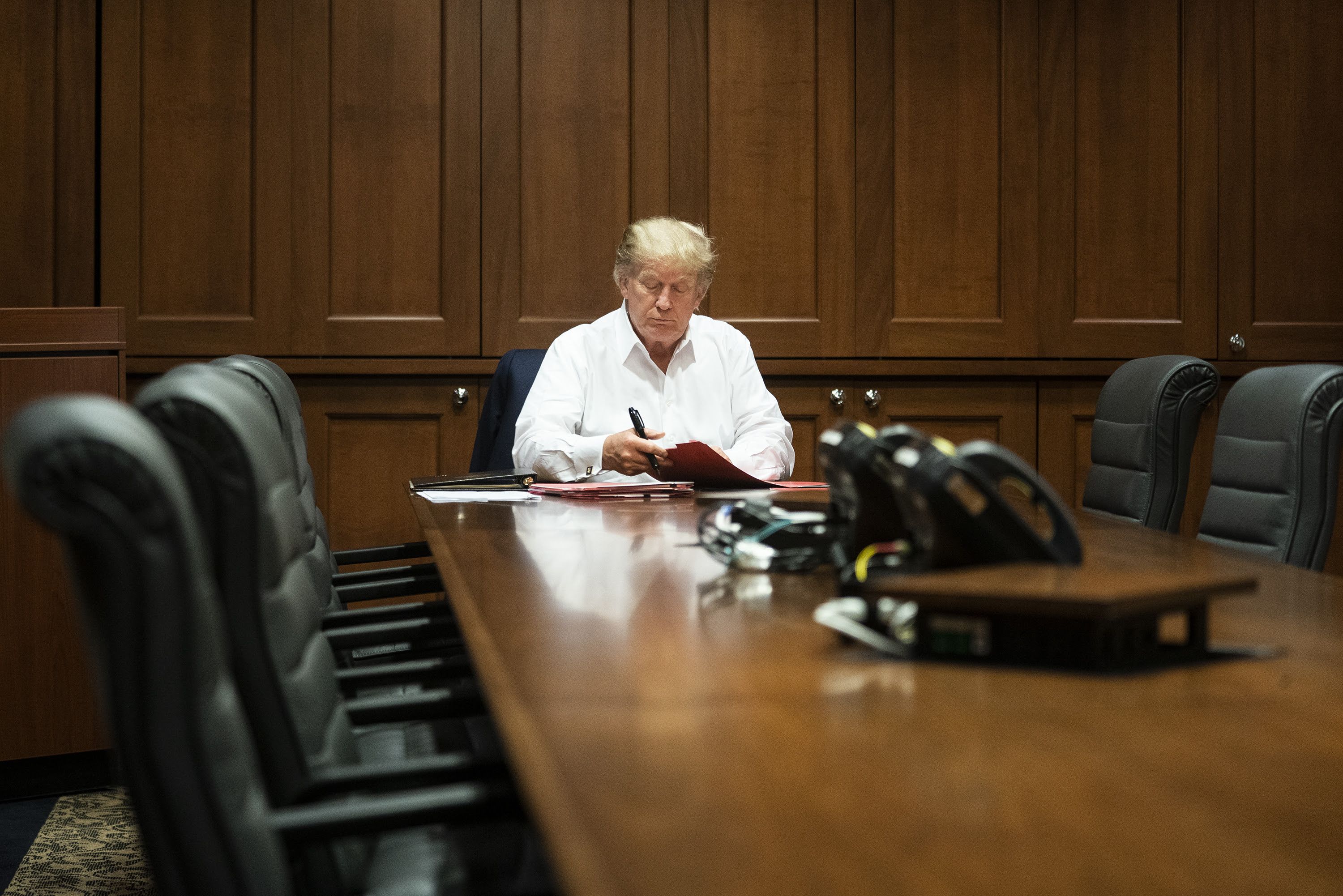  President Donald J. Trump works in his conference room at Walter Reed National Military Medical Center in Bethesda, Md. Saturday, Oct. 3, 2020, after testing positive for COVID-19. 