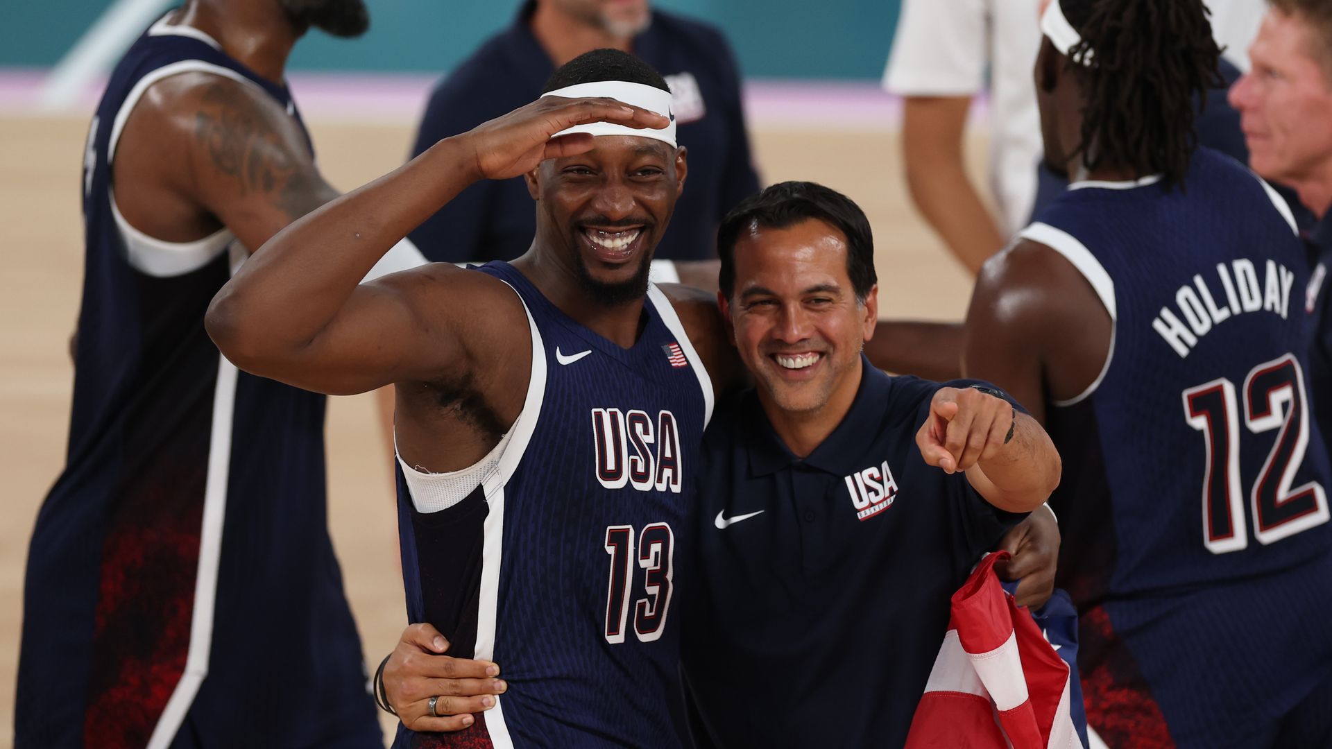 Miami coach Erik Spoelstra and Bam Adebayo smiling. 