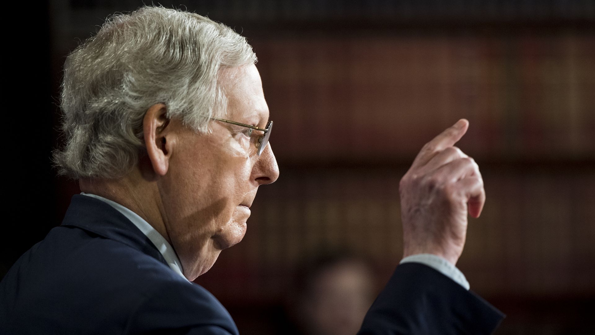 Mitch McConnell answers questions at a press conference